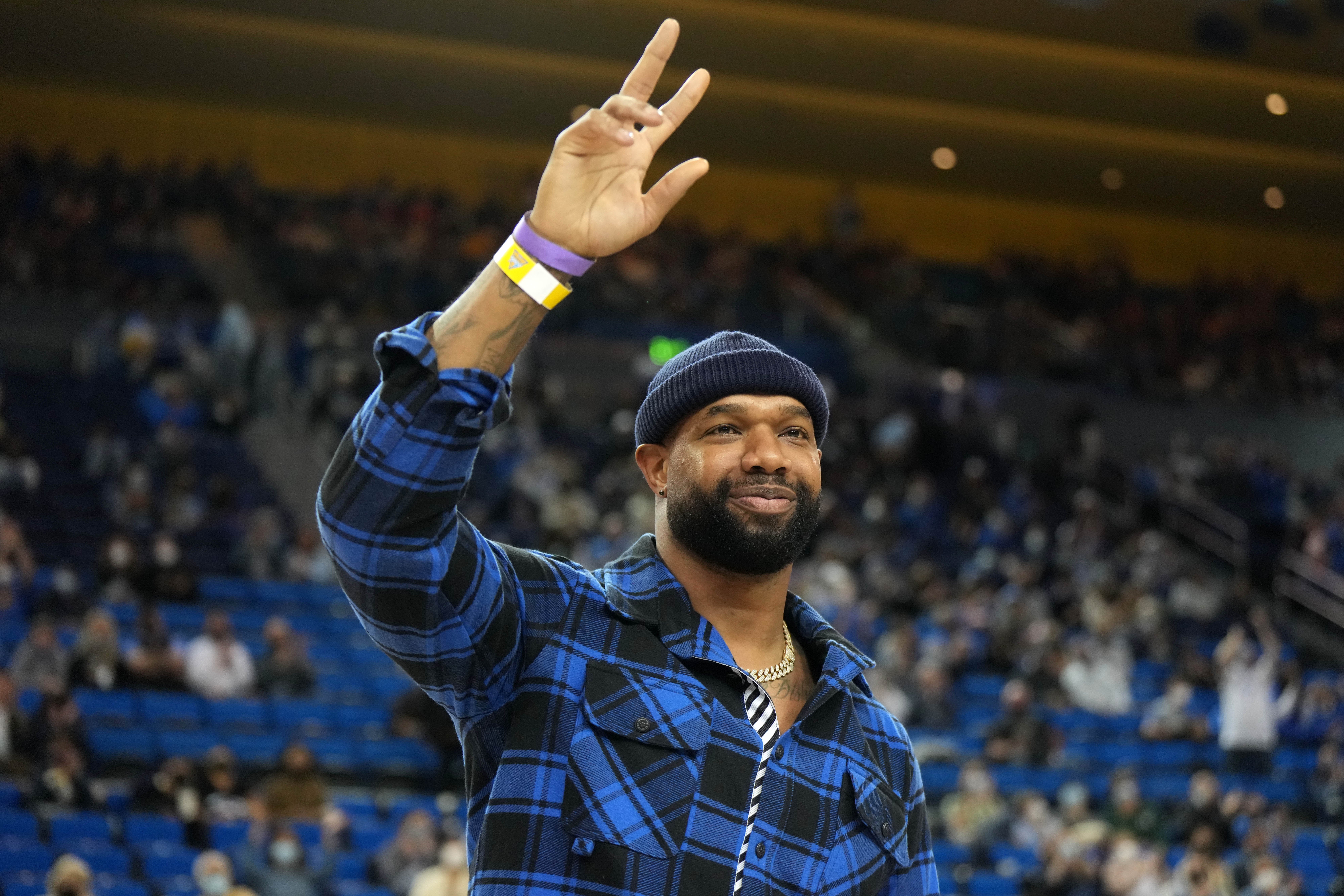 Feb 19, 2022; Los Angeles, California, USA; Green Bay Packers tight end Marcedes Lewis is recognized for his induction into the UCLA Bruins Athletics Hall of Fame at Pauley Pavilion presented by Wescom. Mandatory Credit: Kirby Lee-USA TODAY Sports