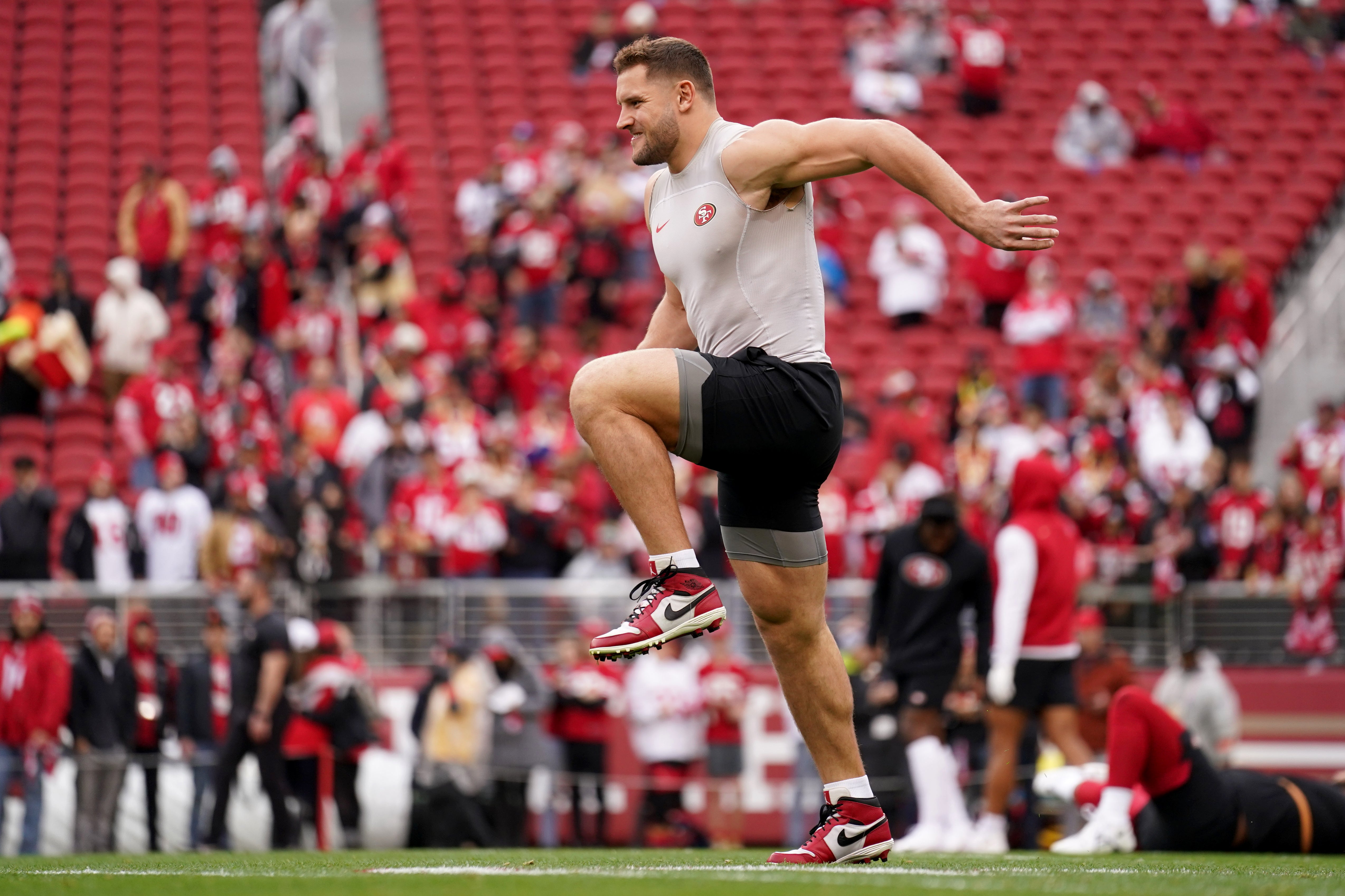 Jan 14, 2023; Santa Clara, California, USA; San Francisco 49ers defensive end Nick Bosa warms up before a wild card game against the Seattle Seahawks at Levi's Stadium. Mandatory Credit: Cary Edmondson-USA TODAY Sports