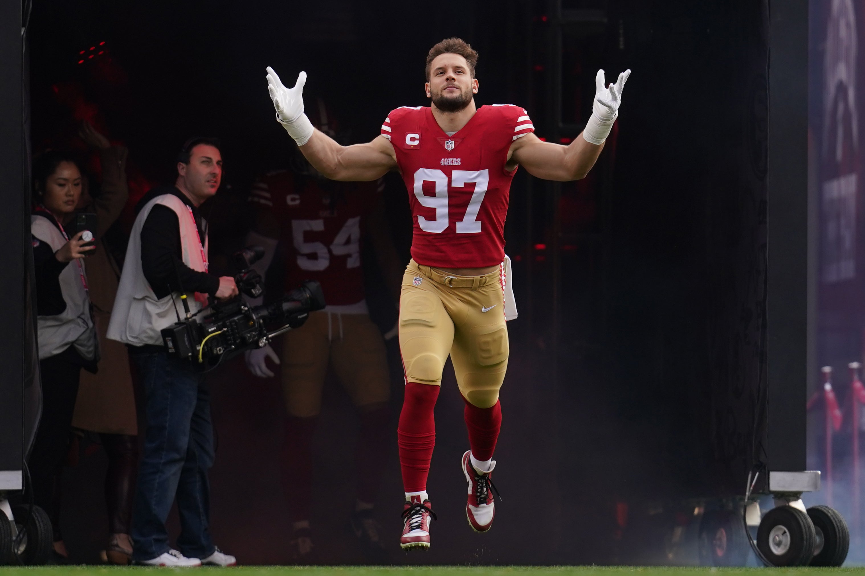 Jan 8, 2023; Santa Clara, California, USA; San Francisco 49ers defensive end Nick Bosa (97) is introduced before the start of the game against the Arizona Cardinals at Levi's Stadium. Mandatory Credit: Cary Edmondson-USA TODAY Sports