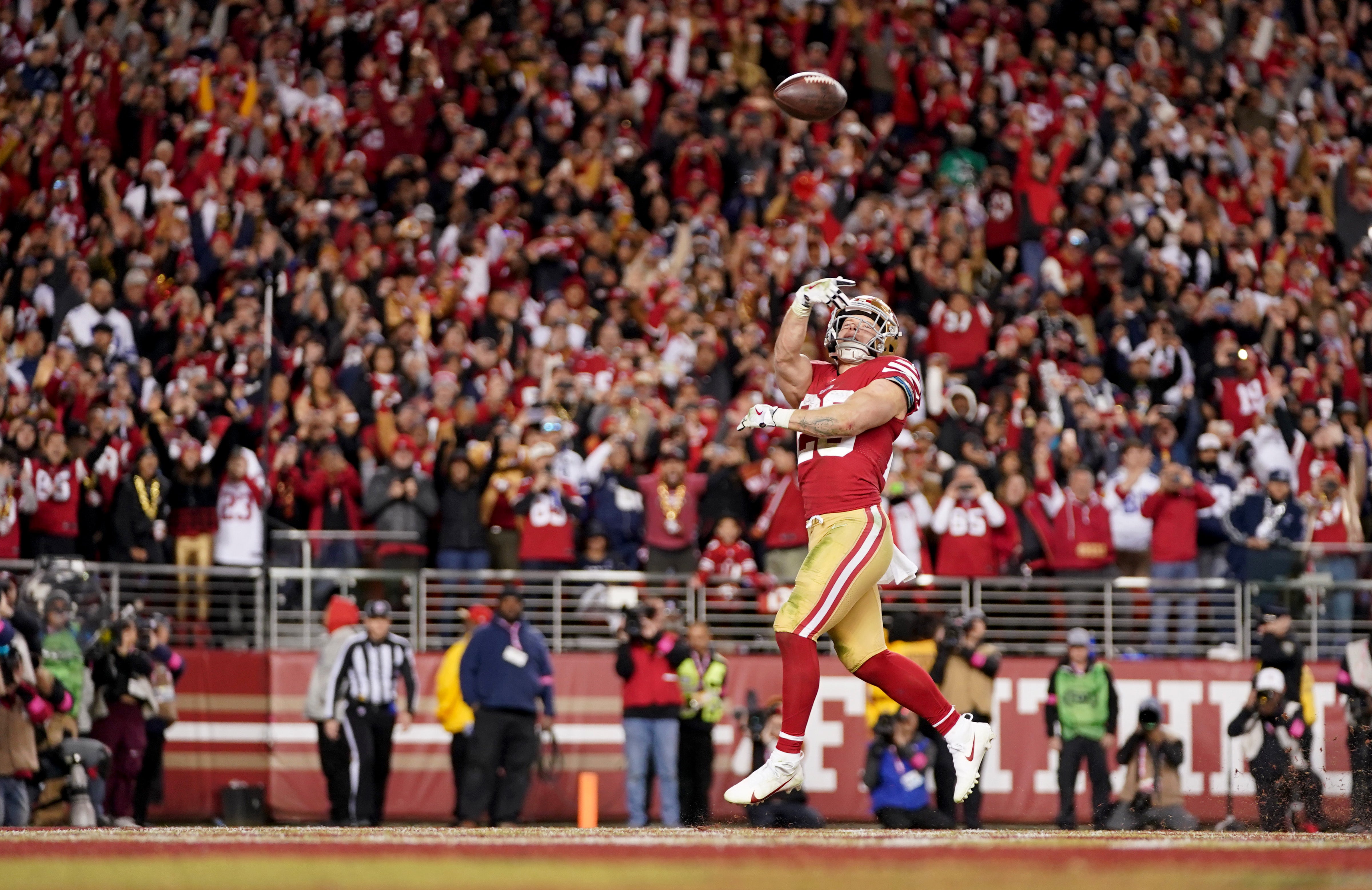 Jan 22, 2023; Santa Clara, California, USA; San Francisco 49ers running back Christian McCaffrey (23) celebrates after scoring a touchdown during the fourth quarter of a NFC divisional round game against the Dallas Cowboys at Levi's Stadium. Mandatory Credit: Kyle Terada-USA TODAY Sports