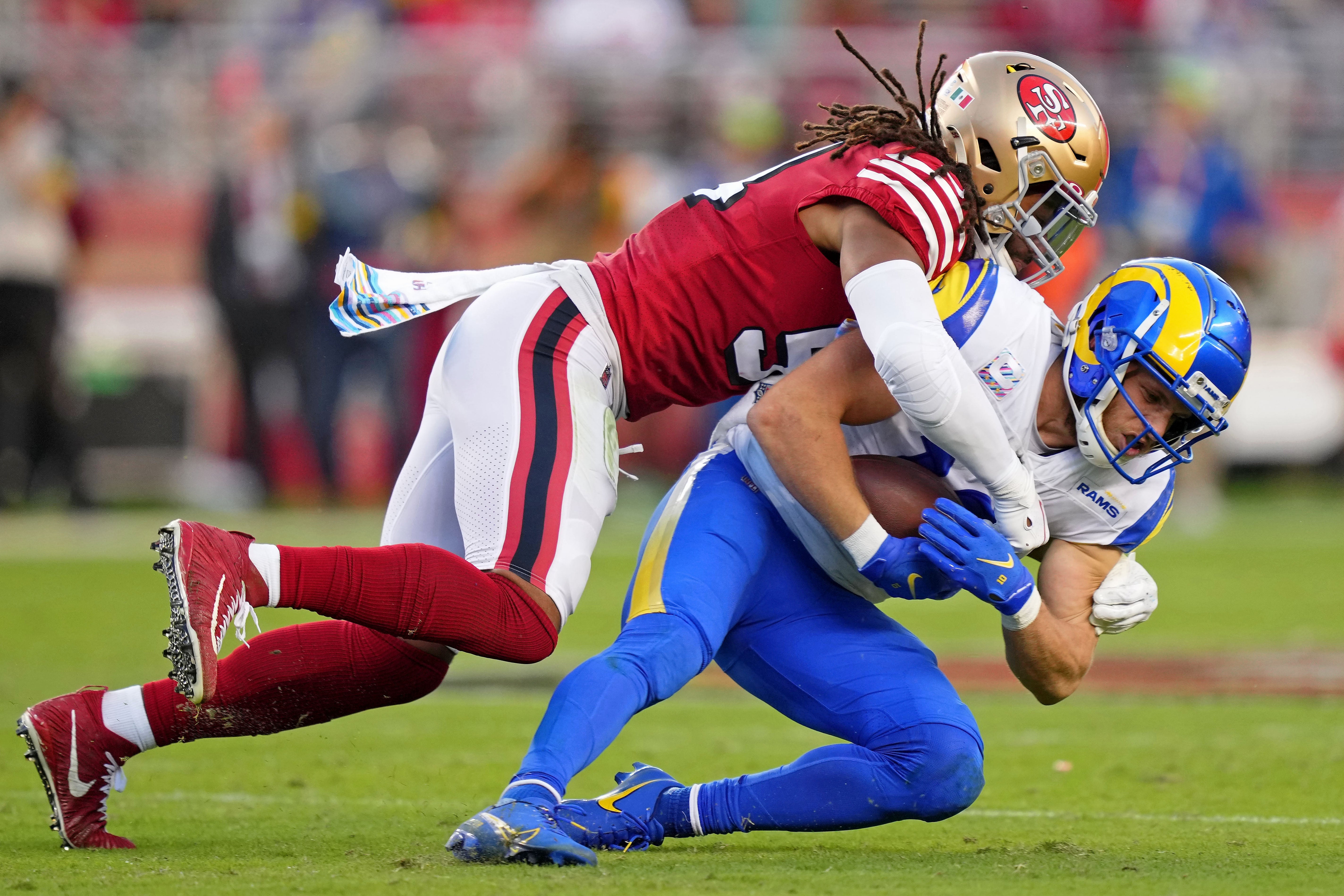 Oct 3, 2022; Santa Clara, California, USA; San Francisco 49ers linebacker Fred Warner (54) tackles Los Angeles Rams wide receiver Cooper Kupp (10) during the second quarter at Levi's Stadium. Mandatory Credit: Kyle Terada-USA TODAY Sports