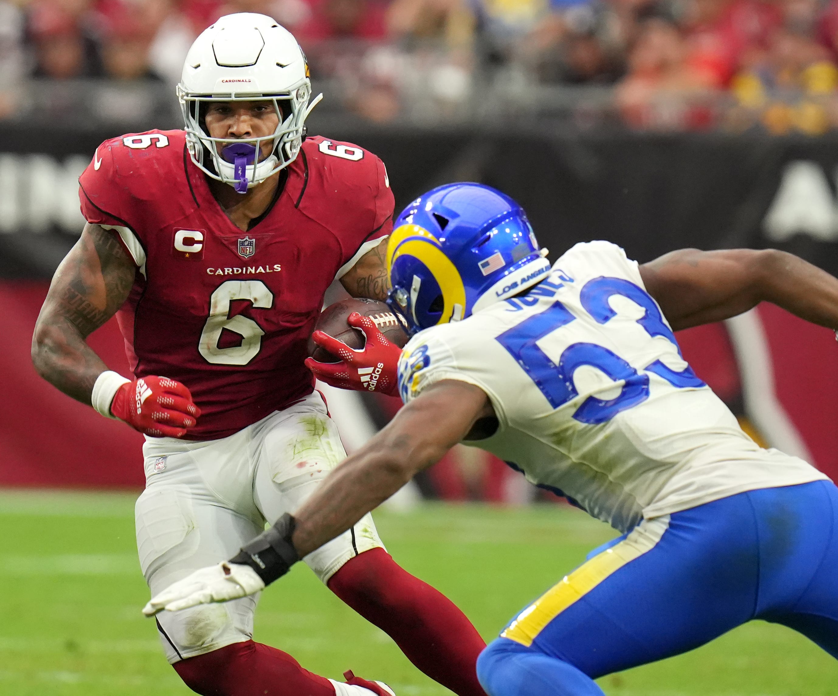 Sep 25, 2022; Glendale, AZ, USA; Arizona Cardinals' James Conner (6) runs the ball into the defense of Los Angeles Rams' Ernest Jones (53) at State Farm Stadium. Nfl Rams At Cardinals. Featured image credit: Joe Rondone/The Republic / USA TODAY NETWORK