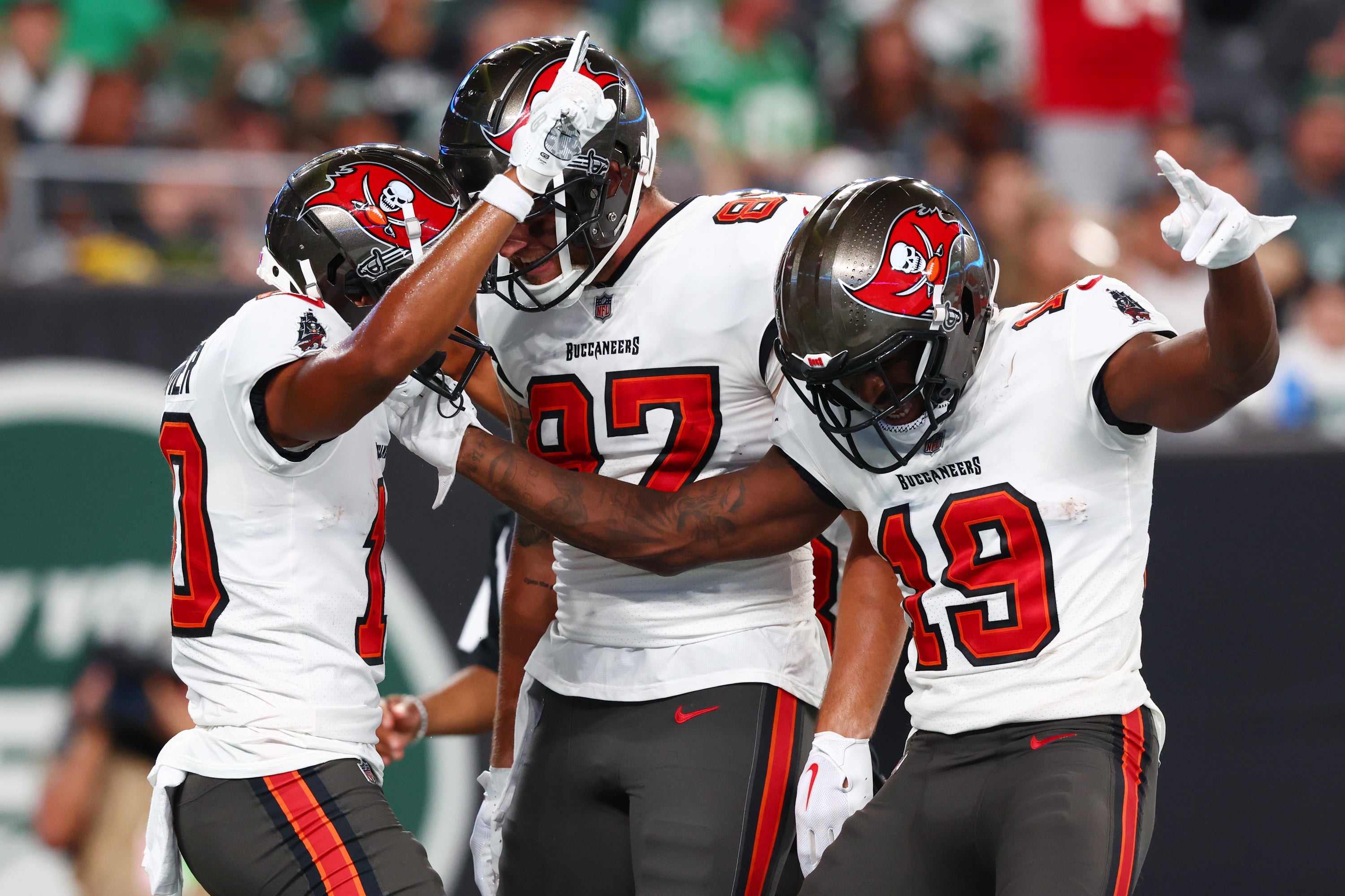 Aug 19, 2023; East Rutherford, New Jersey, USA; Tampa Bay Buccaneers wide receiver Trey Palmer (10) celebrates his touchdown against the New York Jets during the first half at MetLife Stadium. Ed Mulholland-USA TODAY Sports