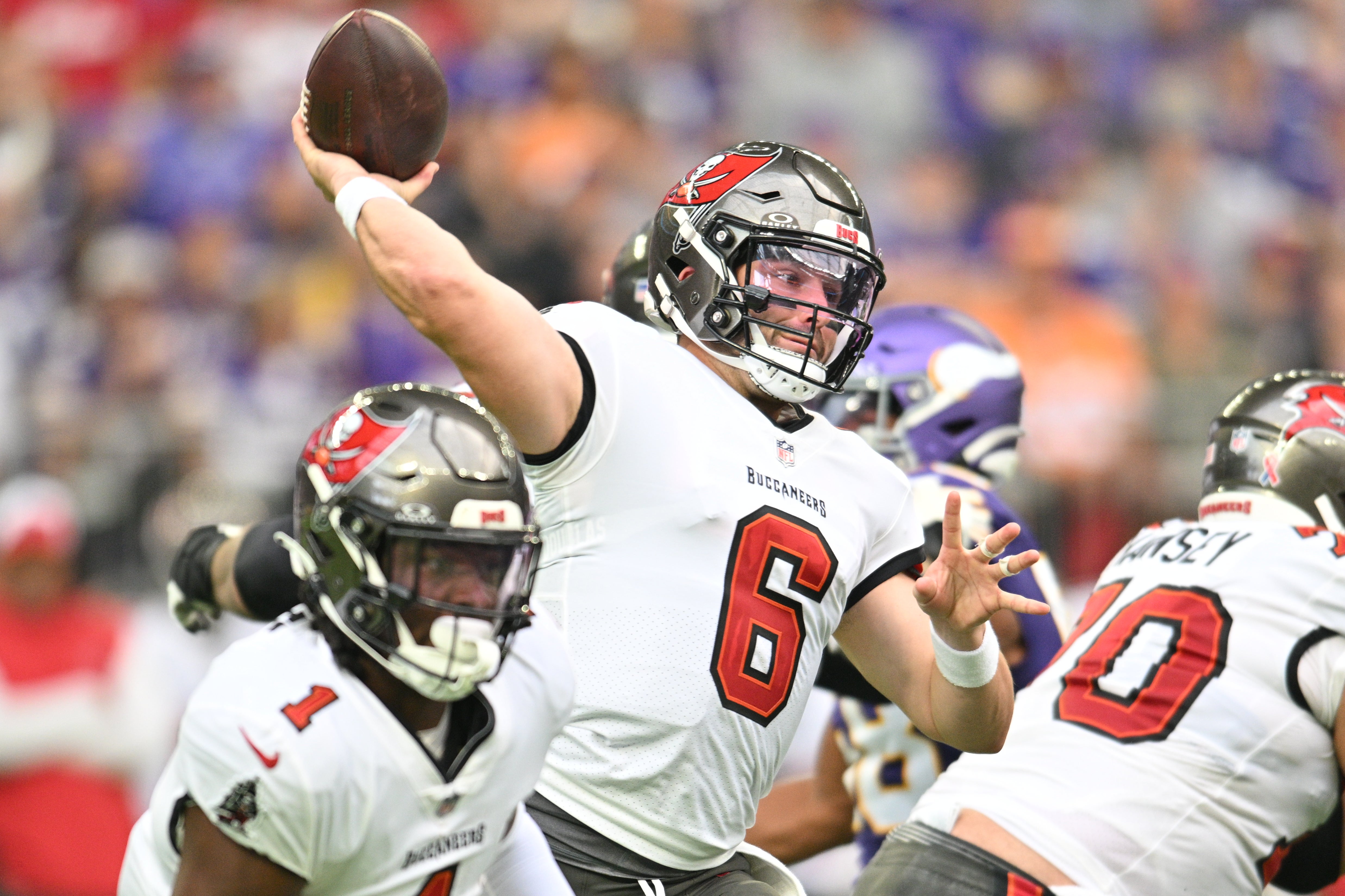 Sep 10, 2023; Minneapolis, Minnesota, USA; Tampa Bay Buccaneers quarterback Baker Mayfield (6) throws a pass against the Minnesota Vikings during the first quarter at U.S. Bank Stadium. Mandatory Credit: Jeffrey Becker-USA TODAY Sports