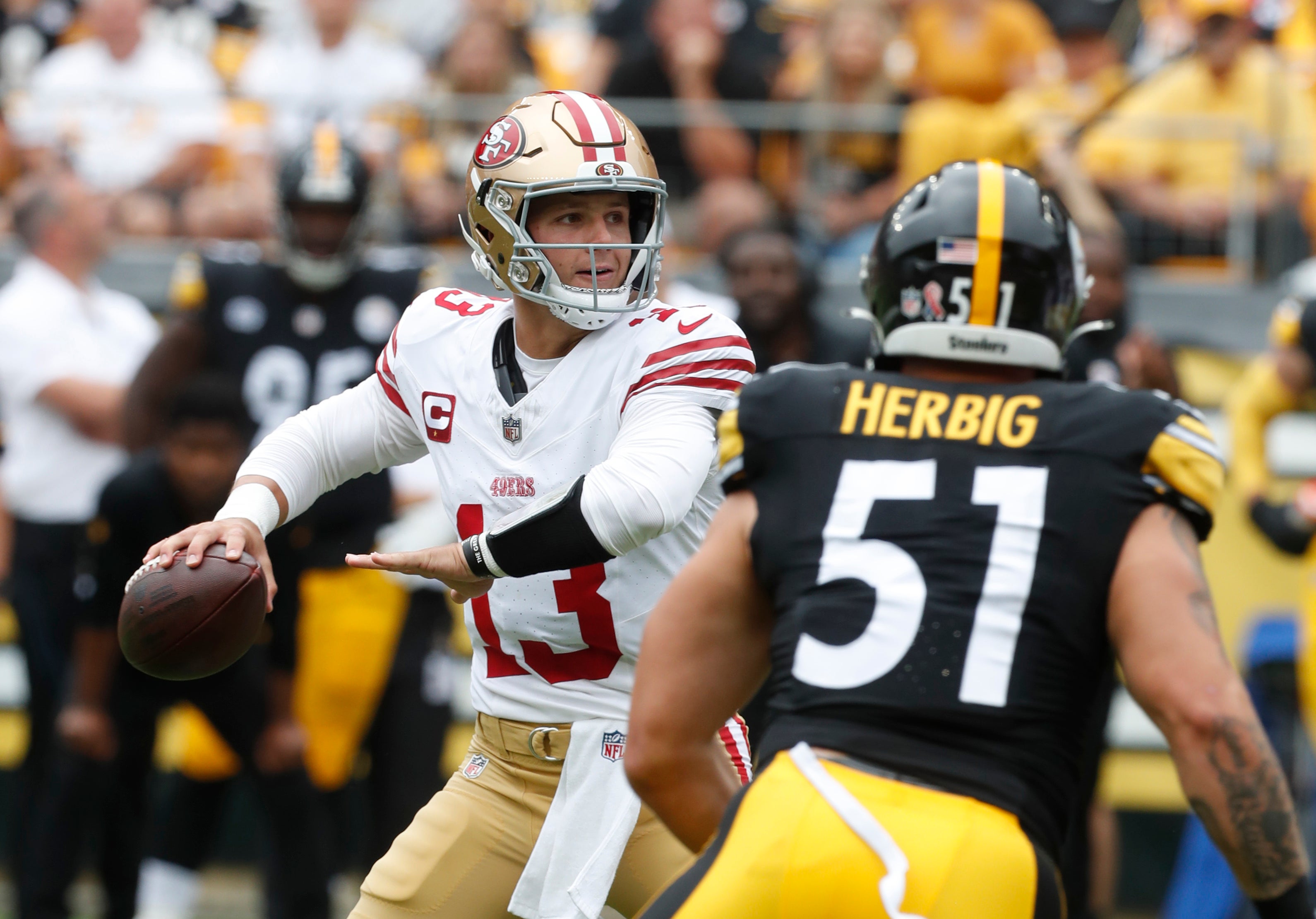 Sep 10, 2023; Pittsburgh, Pennsylvania, USA; San Francisco 49ers quarterback Brock Purdy (13) passes against the Pittsburgh Steelers during the first quarter at Acrisure Stadium. Mandatory Credit: Charles LeClaire-USA TODAY Sports
