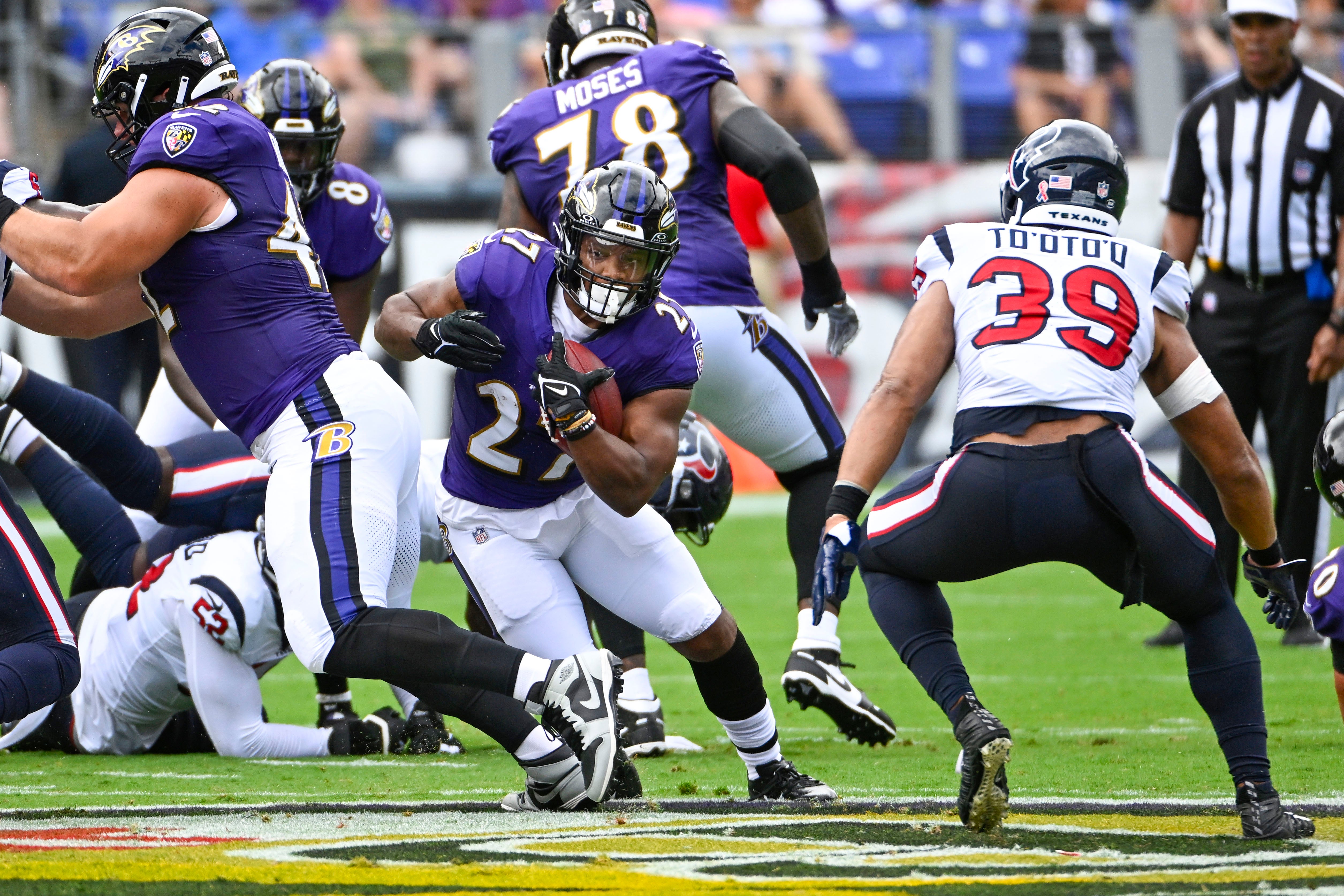 Sep 10, 2023; Baltimore, Maryland, USA; Baltimore Ravens running back J.K. Dobbins (27) carries the ball against the Houston Texans during the first half at M&T Bank Stadium.