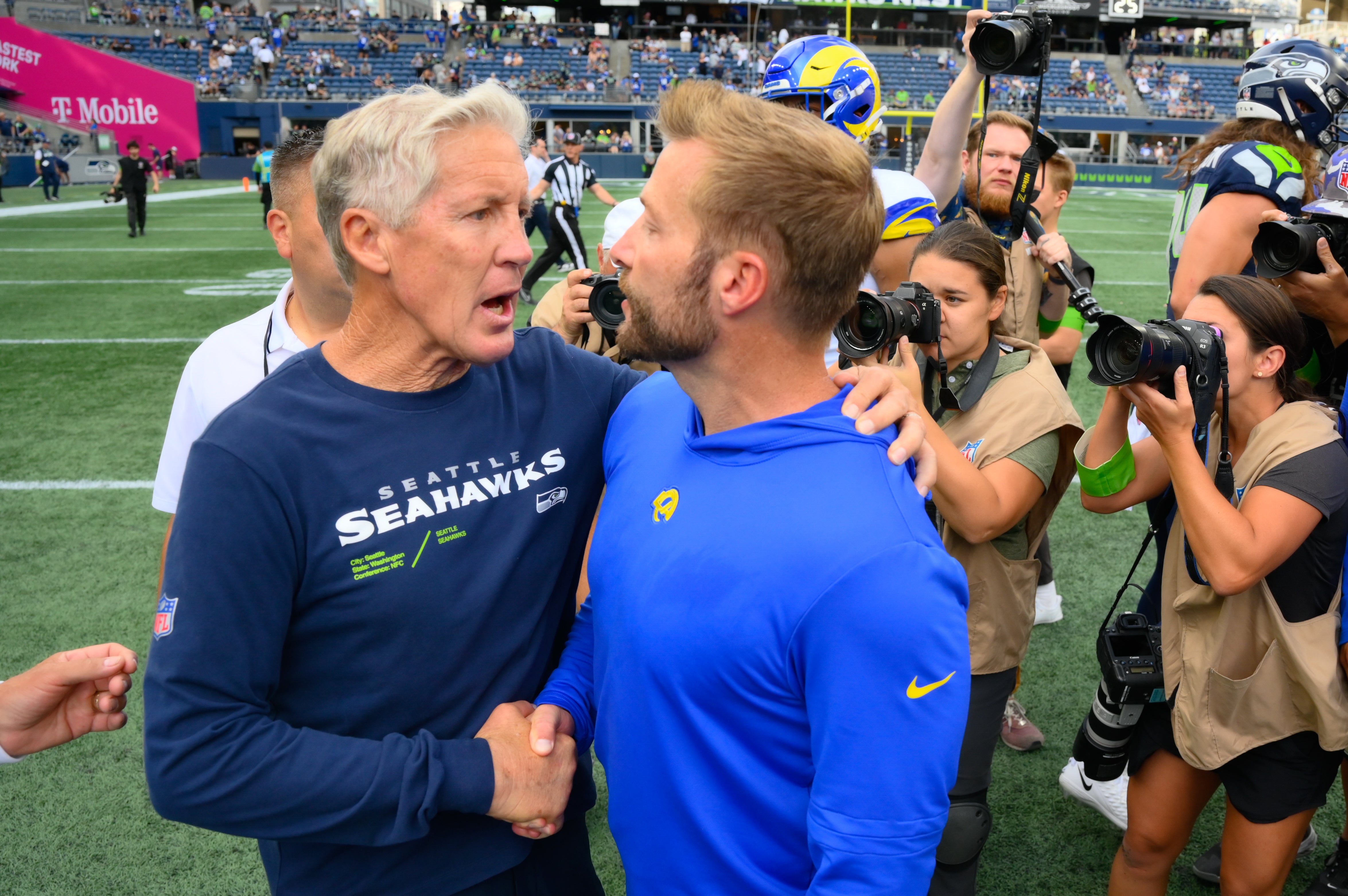 Sep 10, 2023; Seattle, Washington, USA; Seattle Seahawks head coach Pete Carroll and Los Angeles Rams head coach Sean McVay shake hands after the game at Lumen Field. Mandatory Credit: Steven Bisig-USA TODAY Sports