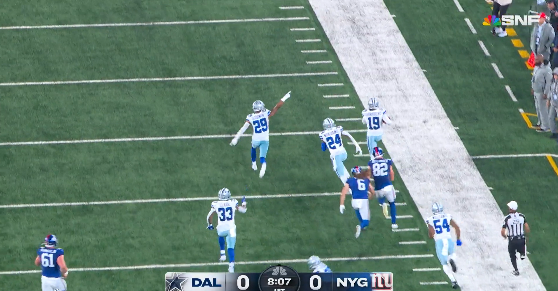 Dallas Cowboys CB Noah Igbinoghene (Number 19) returns a blocked field goal for a touchdown.