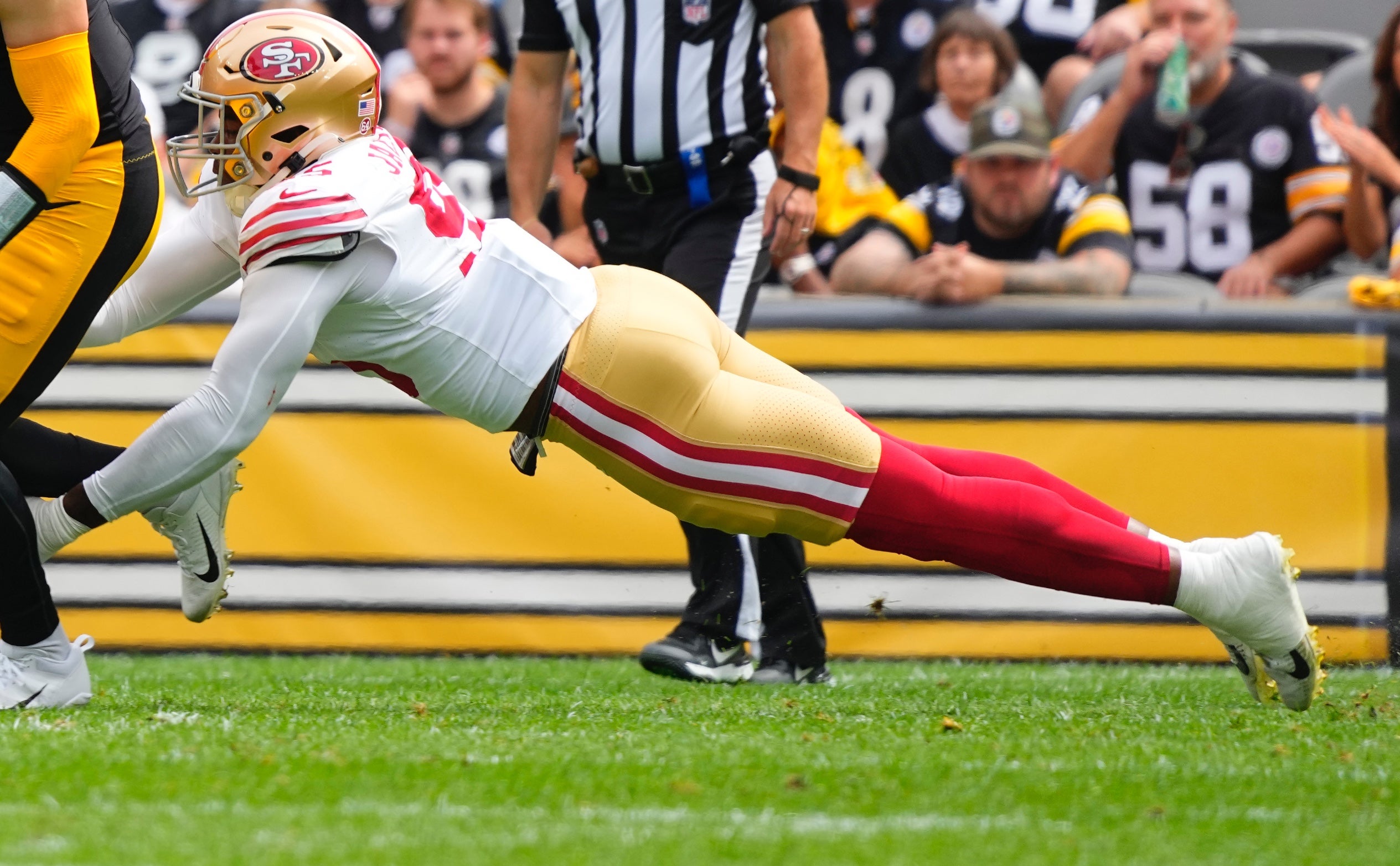Sep 10, 2023; Pittsburgh, Pennsylvania, USA; San Francisco 49ers defensive end Drake Jackson (95) tackles Pittsburgh Steelers quarterback Kenny.Pickett (8) during the first half at Acrisure Stadium. Mandatory Credit: Gregory Fisher-USA TODAY Sports