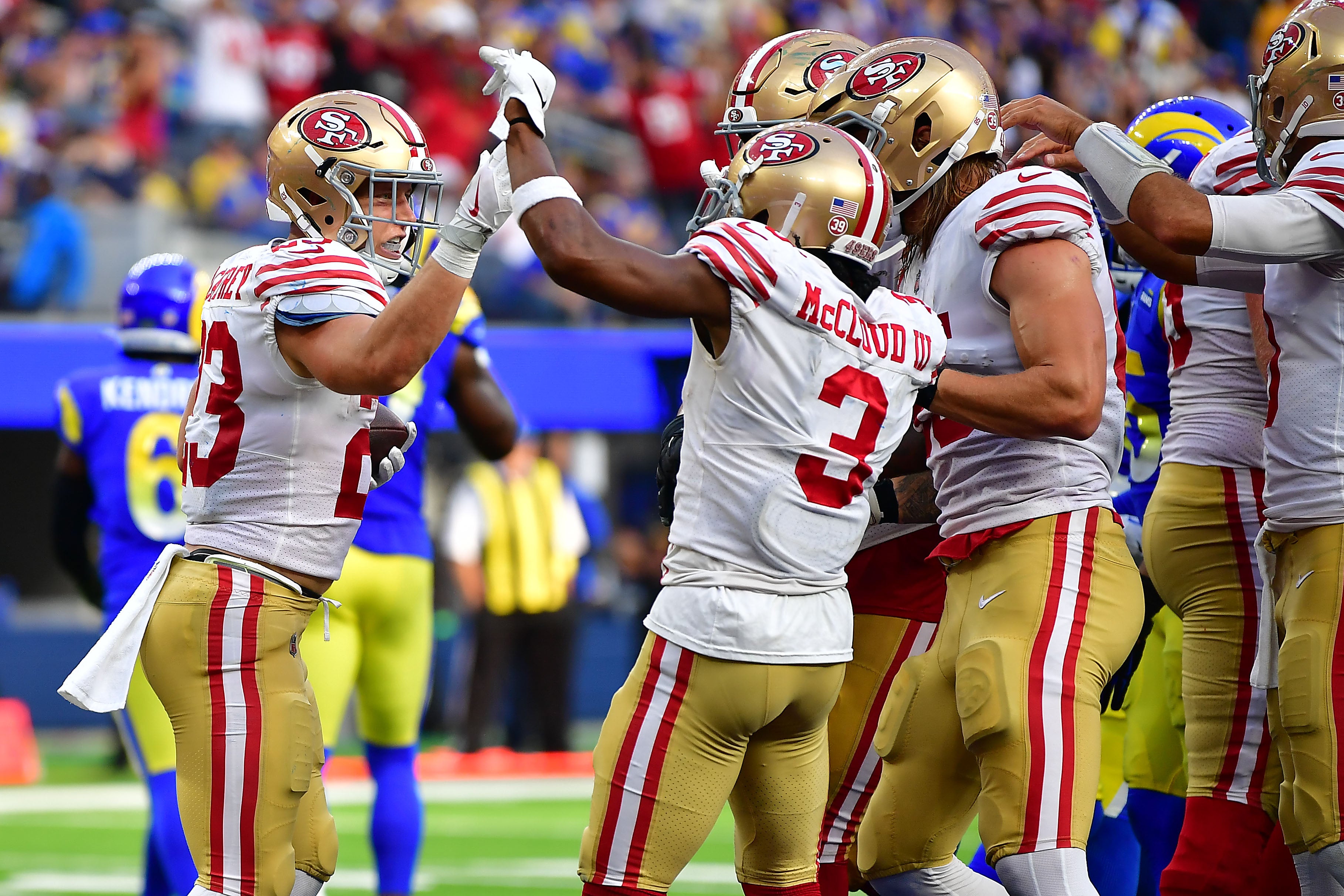 Oct 30, 2022; Inglewood, California, USA; San Francisco 49ers running back Christian McCaffrey (23) celebrates his touchdown scored against the Los Angeles Rams with wide receiver Ray-Ray McCloud III (3) during the second half at SoFi Stadium. Mandatory Credit: Gary A. Vasquez-USA TODAY Sports