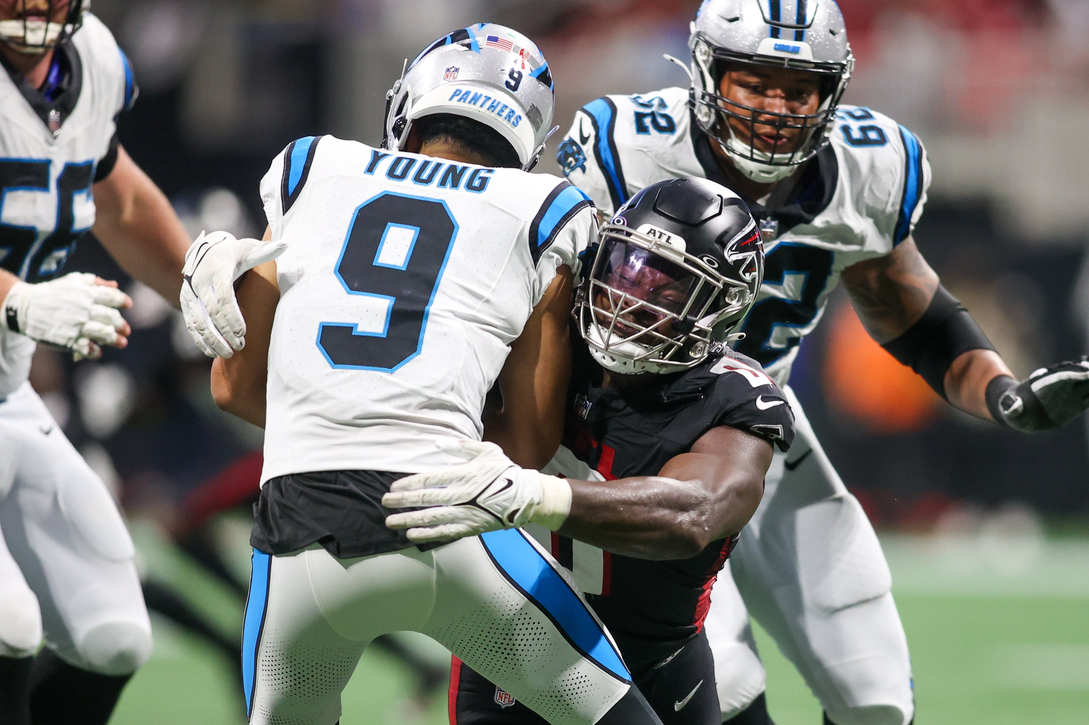 Sep 10, 2023; Atlanta, Georgia, USA; Atlanta Falcons linebacker Lorenzo Carter (0) sacks Carolina Panthers quarterback Bryce Young (9) in the second half at Mercedes-Benz Stadium. Mandatory Credit: Brett Davis-USA TODAY Sports