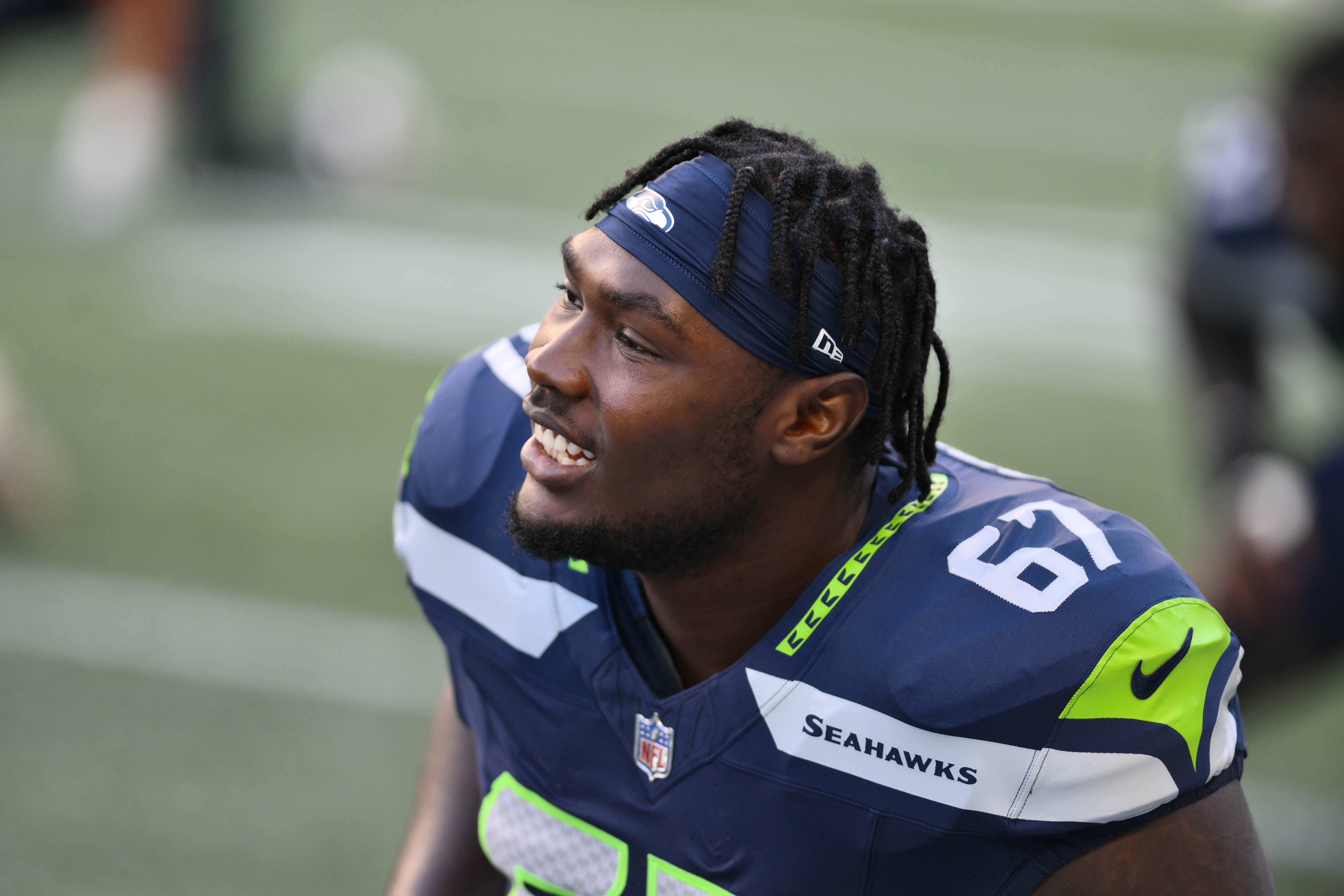 Aug 10, 2023; Seattle, Washington, USA; Seattle Seahawks offensive tackle Charles Cross (67) during warmups prior to the game at Lumen Field. Mandatory Credit: Steven Bisig-USA TODAY Sports