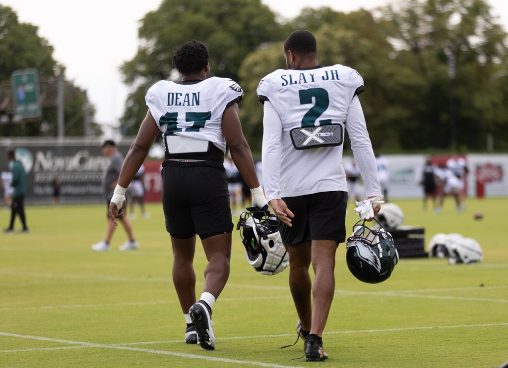 Eagles linebacker Nakobe Dean and cornerback Darius Slay.