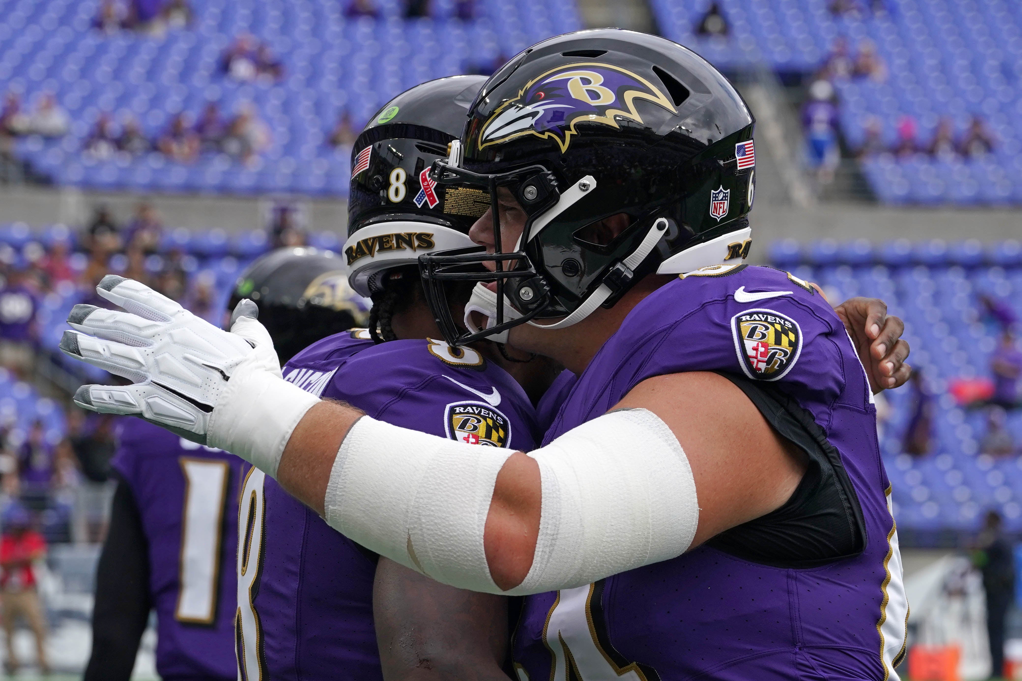 Sep 10, 2023; Baltimore, Maryland, USA; Baltimore Ravens quarterback Lamar Jackson (8) greets center Tyler Linderbaum (64) prior to the game against the Houston Texans at M&T Bank Stadium. Mandatory Credit: Mitch Stringer-USA TODAY Sports