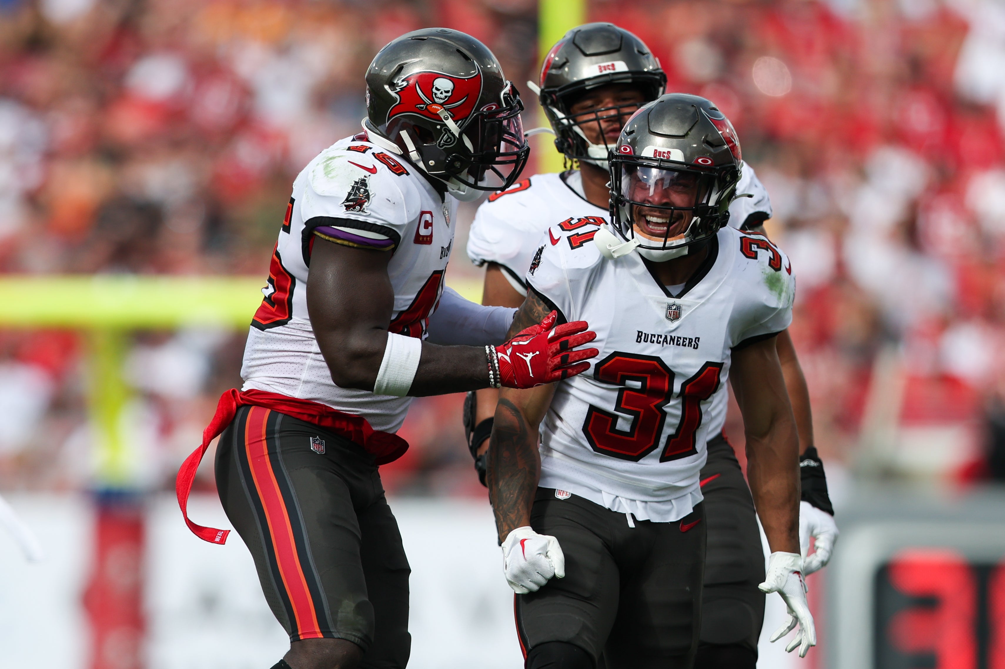 Jan 1, 2023; Tampa, Florida, USA; Tampa Bay Buccaneers safety Antoine Winfield Jr. (31) celebrates after a sack against the Carolina Panthers in the second quarter at Raymond James Stadium. Mandatory Credit: Nathan Ray Seebeck-USA TODAY Sports