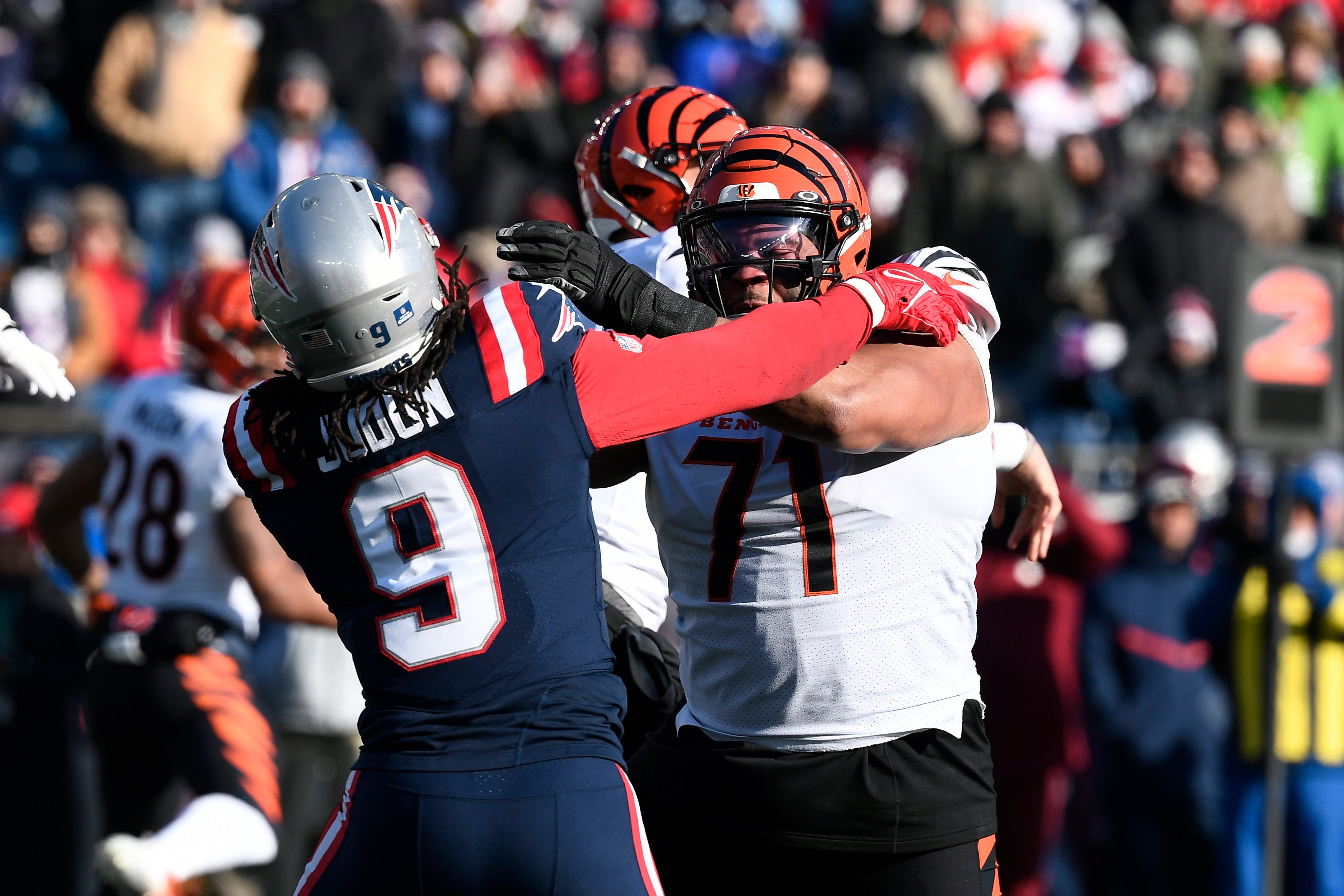 Dec 24, 2022; Foxborough, Massachusetts, USA; Cincinnati Bengals offensive tackle La'el Collins (71) blocks New England Patriots linebacker Matthew Judon (9) during the first half at Gillette Stadium