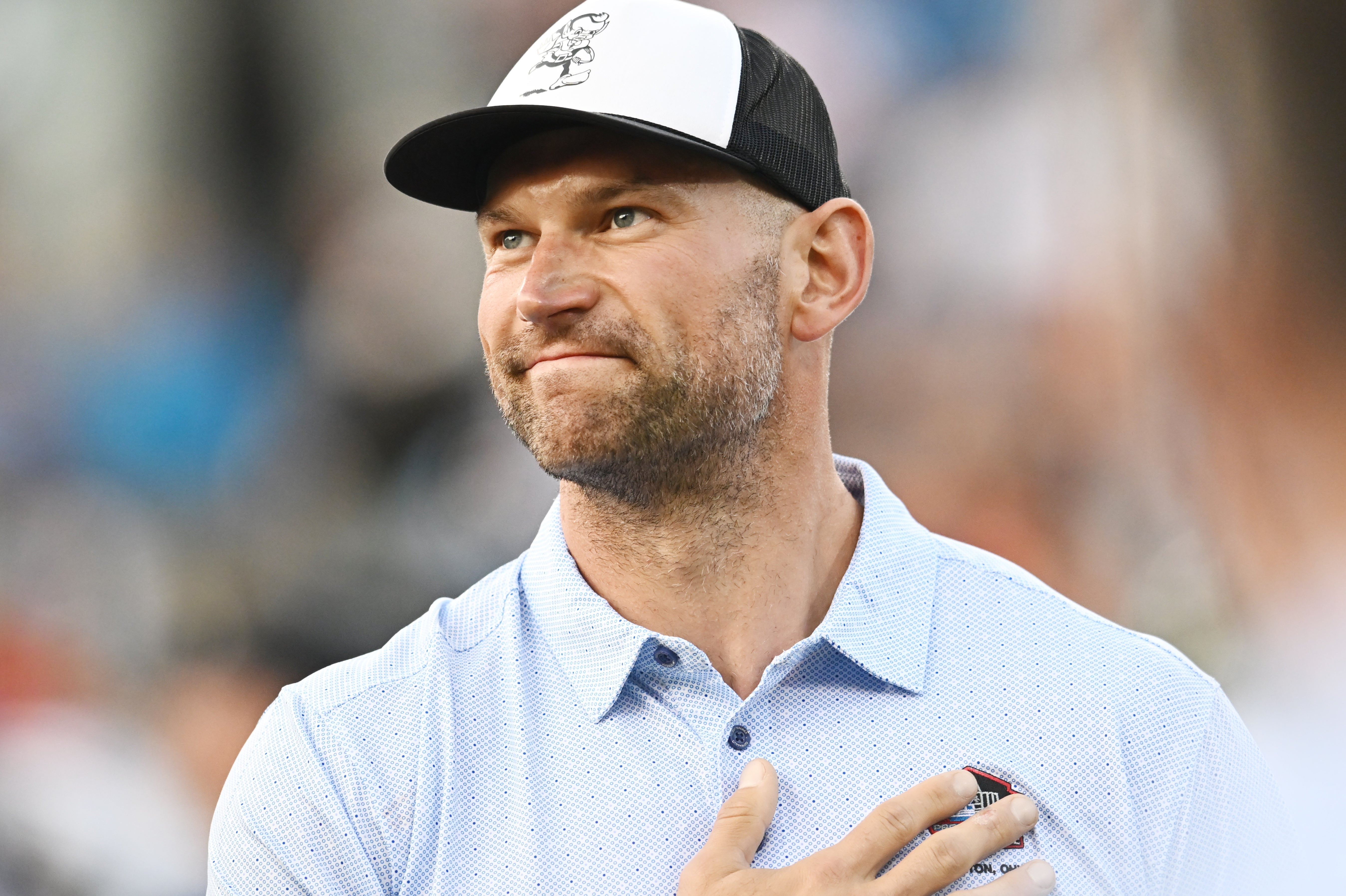Aug 3, 2023; Canton, Ohio, USA; NFL Hall of Fame inductee Joe Thomas acknowledges the crowd before the game between the Cleveland Browns and the New York Jets at Tom Benson Hall of Fame Stadium. Mandatory Credit: Ken Blaze-USA TODAY Sports