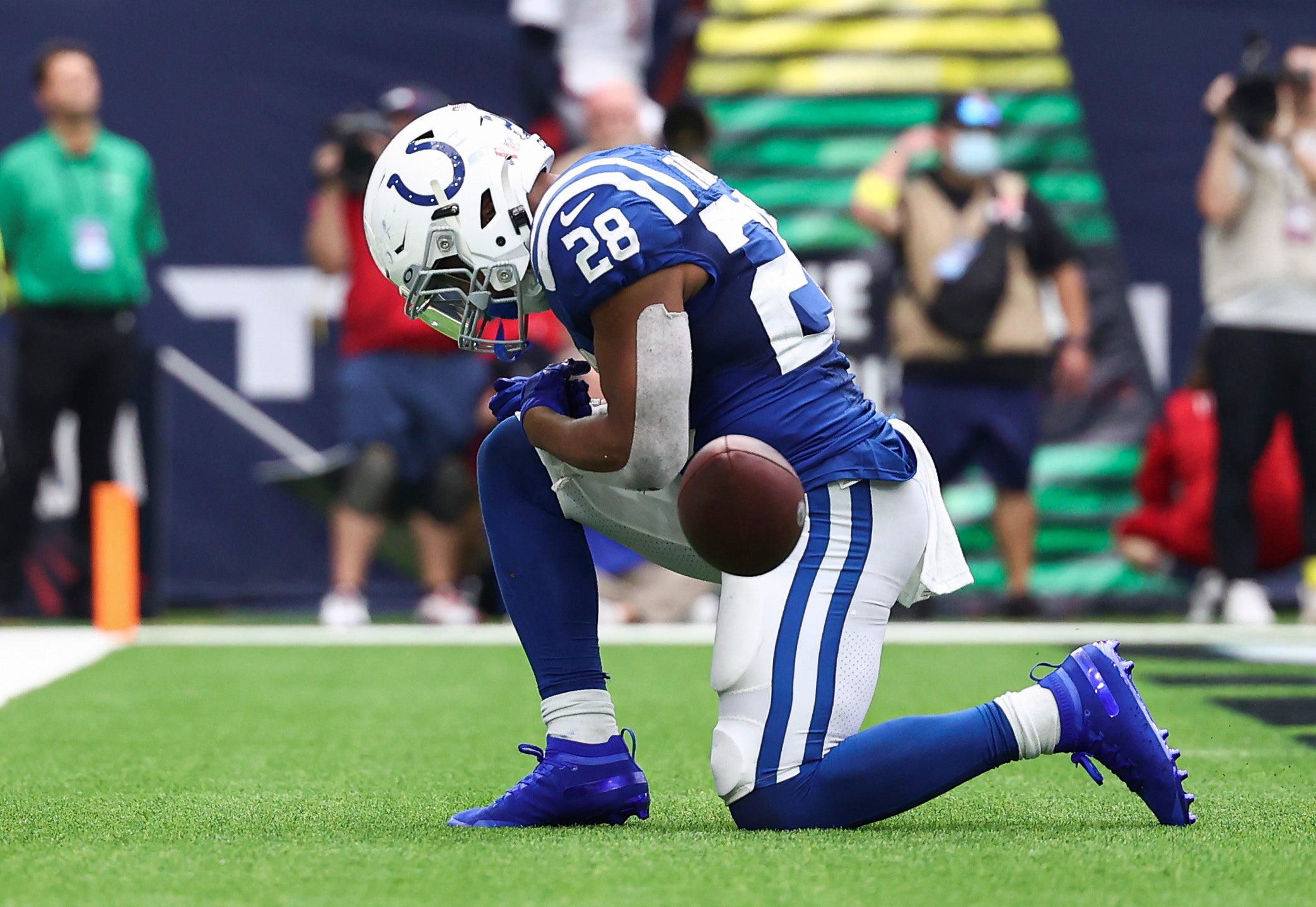 Sep 11, 2022; Houston, Texas, USA; Indianapolis Colts running back Jonathan Taylor (28) kneels in the end zone after scoring a touchdown during the fourth quarter against the Houston Texans at NRG Stadium.