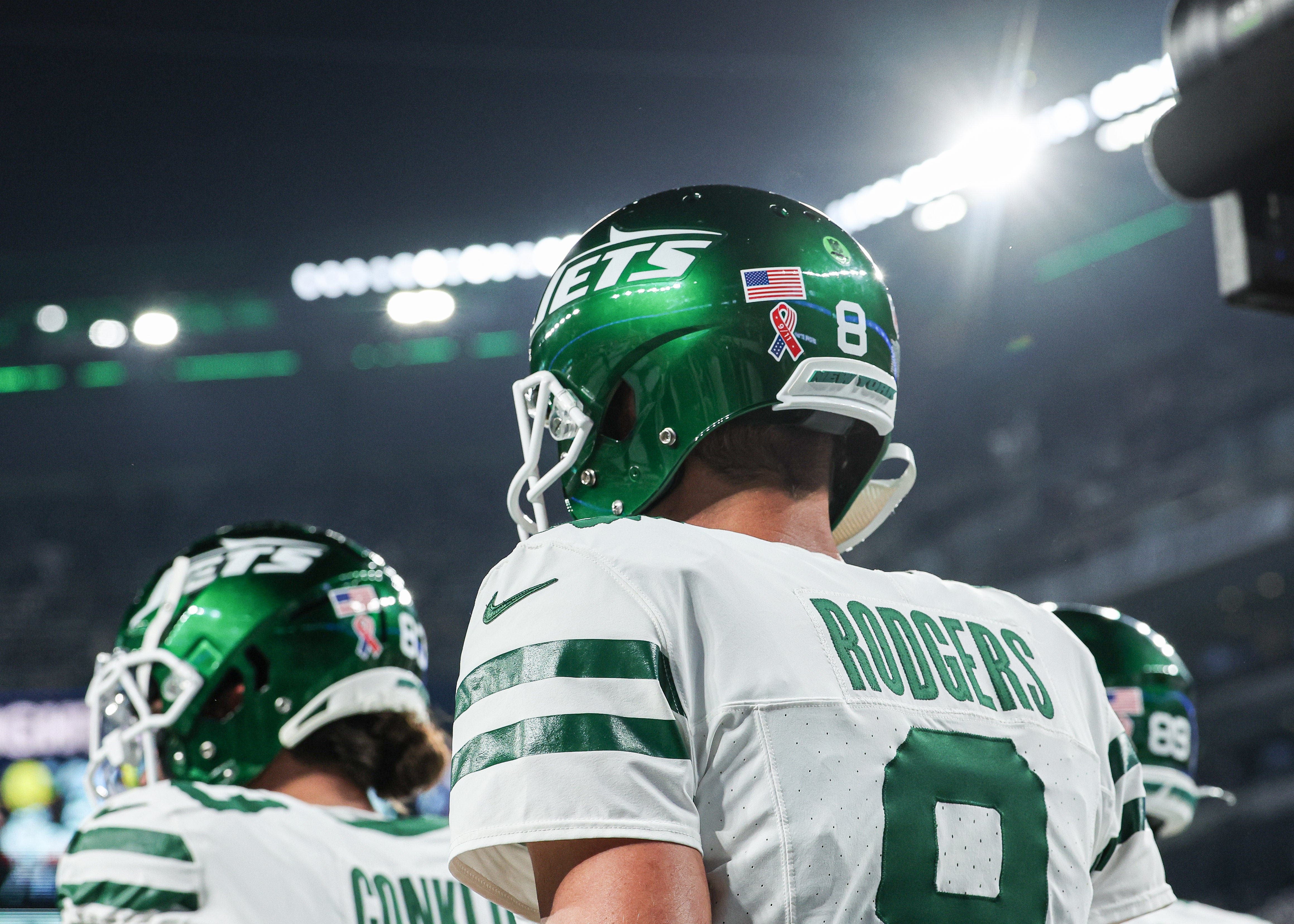 Sep 11, 2023; East Rutherford, New Jersey, USA; New York Jets quarterback Aaron Rodgers (8) walks on the field at MetLife Stadium before the game against the Buffalo Bills. Mandatory Credit: Vincent Carchietta-USA TODAY Sports