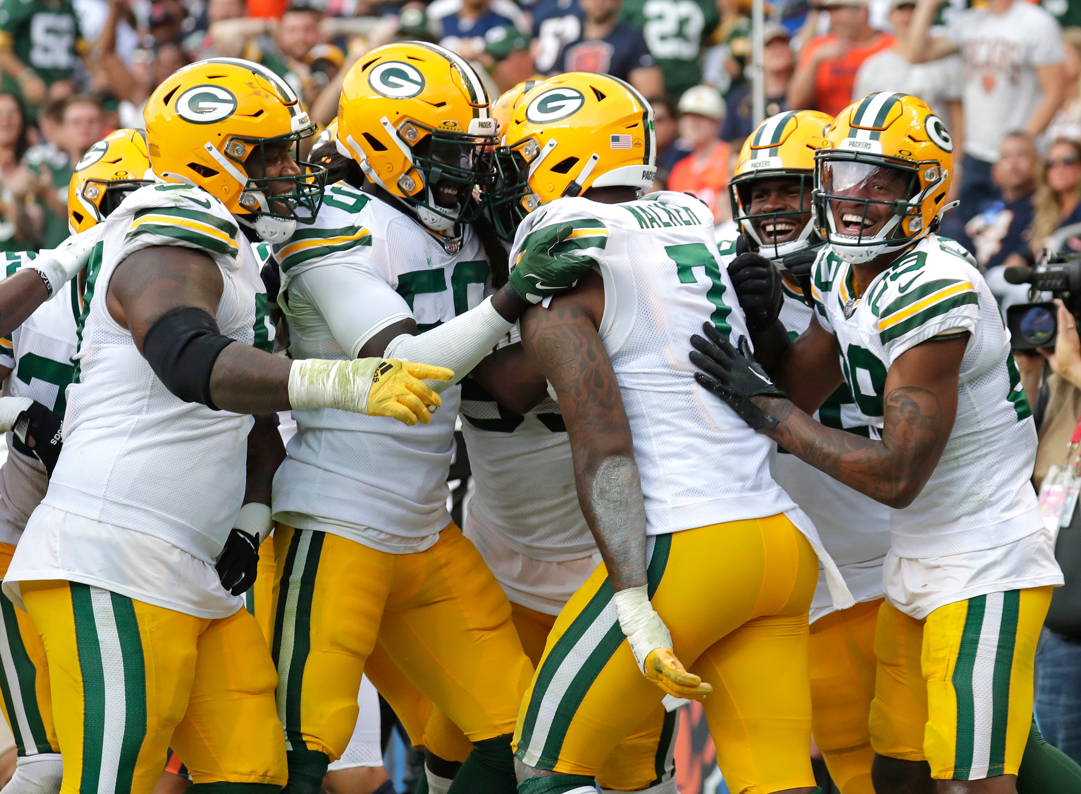 Green Bay Packers linebacker Quay Walker (7) is swarmed by teammates after running back an interception for a touchdown against the Chicago Bears in the fourth quarter during their football game Sunday, September 10, 2023, at Soldier Field in Chicago, Ill. Green Bay won 38-20. Dan Powers/USA TODAY NETWORK-Wisconsin / USA TODAY NETWORK