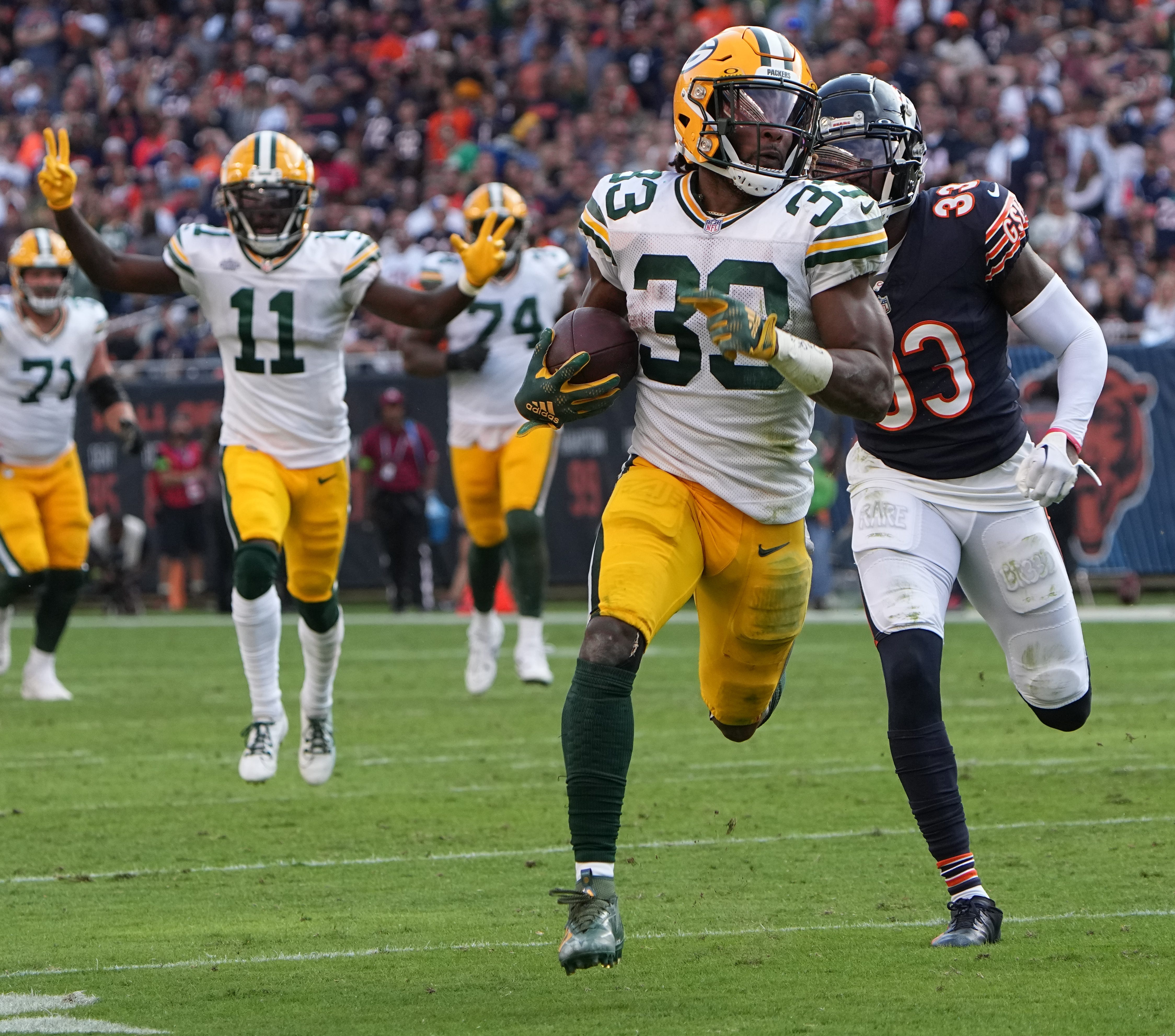 Green Bay Packers running back Aaron Jones (33) scores a touchdown on a 35-yard reception during the third quarter of their regular season opening game Sunday, September 10, 2023 at Soldier Field in Chicago, Ill. The Green Bay Packers beat the Chicago Bears 38-20. Mark Hoffman/Milwaukee Journal Sentinel / USA TODAY NETWORK