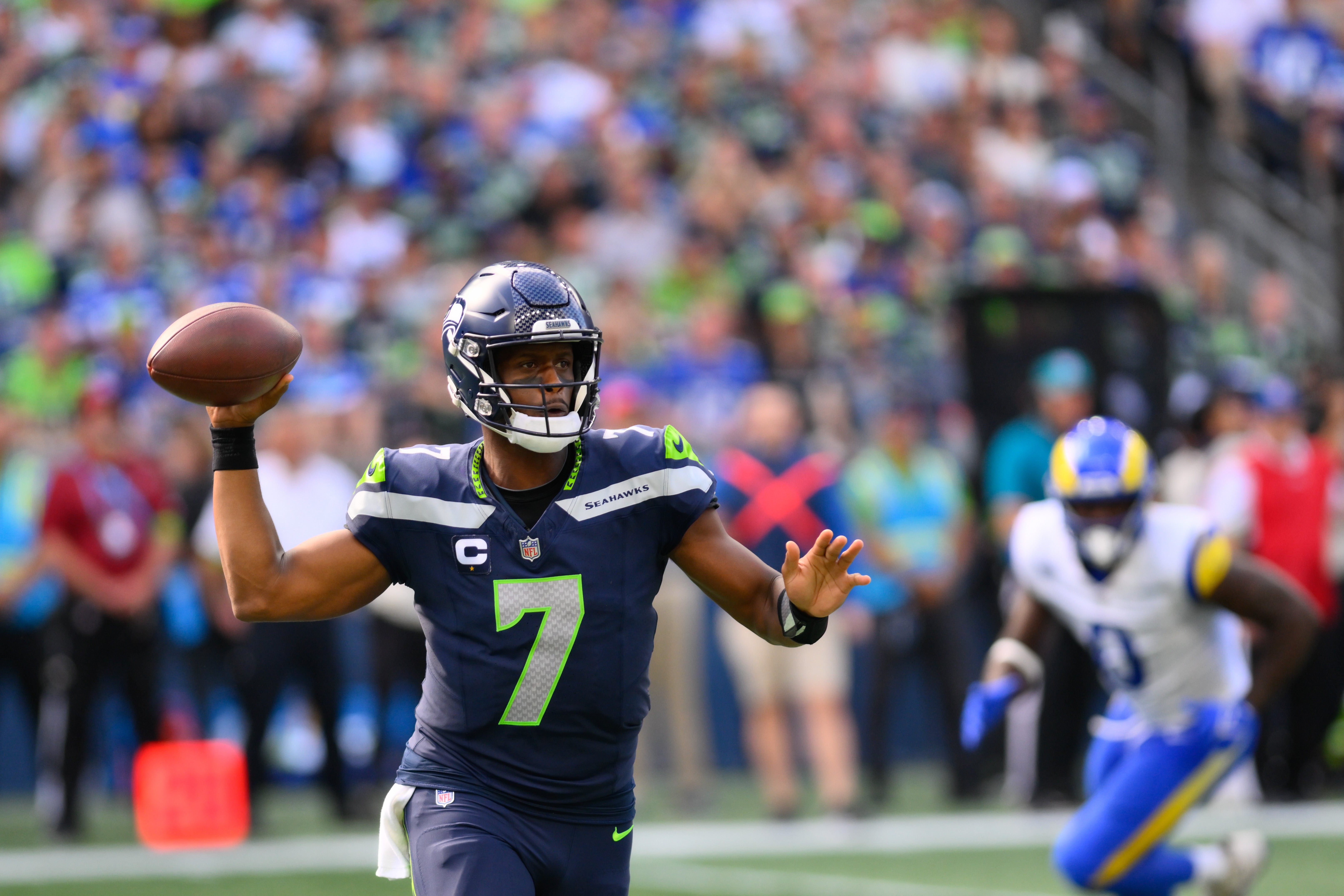 Sep 10, 2023; Seattle, Washington, USA; Seattle Seahawks quarterback Geno Smith (7) passes the ball against the Los Angeles Rams during the second half at Lumen Field. Mandatory Credit: Steven Bisig-USA TODAY Sports