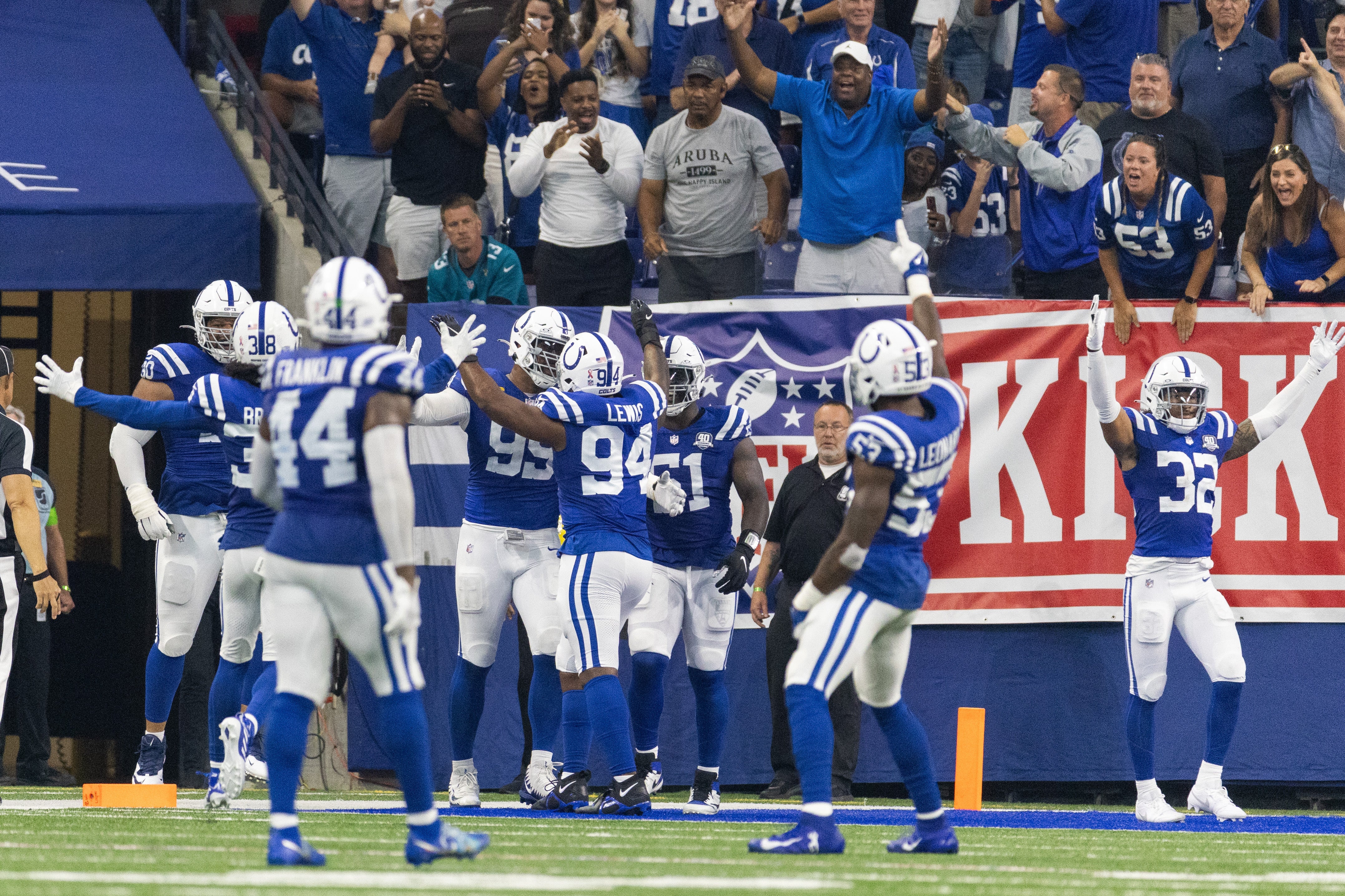 Sep 10, 2023; Indianapolis, Indiana, USA; Indianapolis Colts defensive tackle DeForest Buckner (99) celebrates his touchdown with teammates in the second half against the Jacksonville Jaguars at Lucas Oil Stadium.