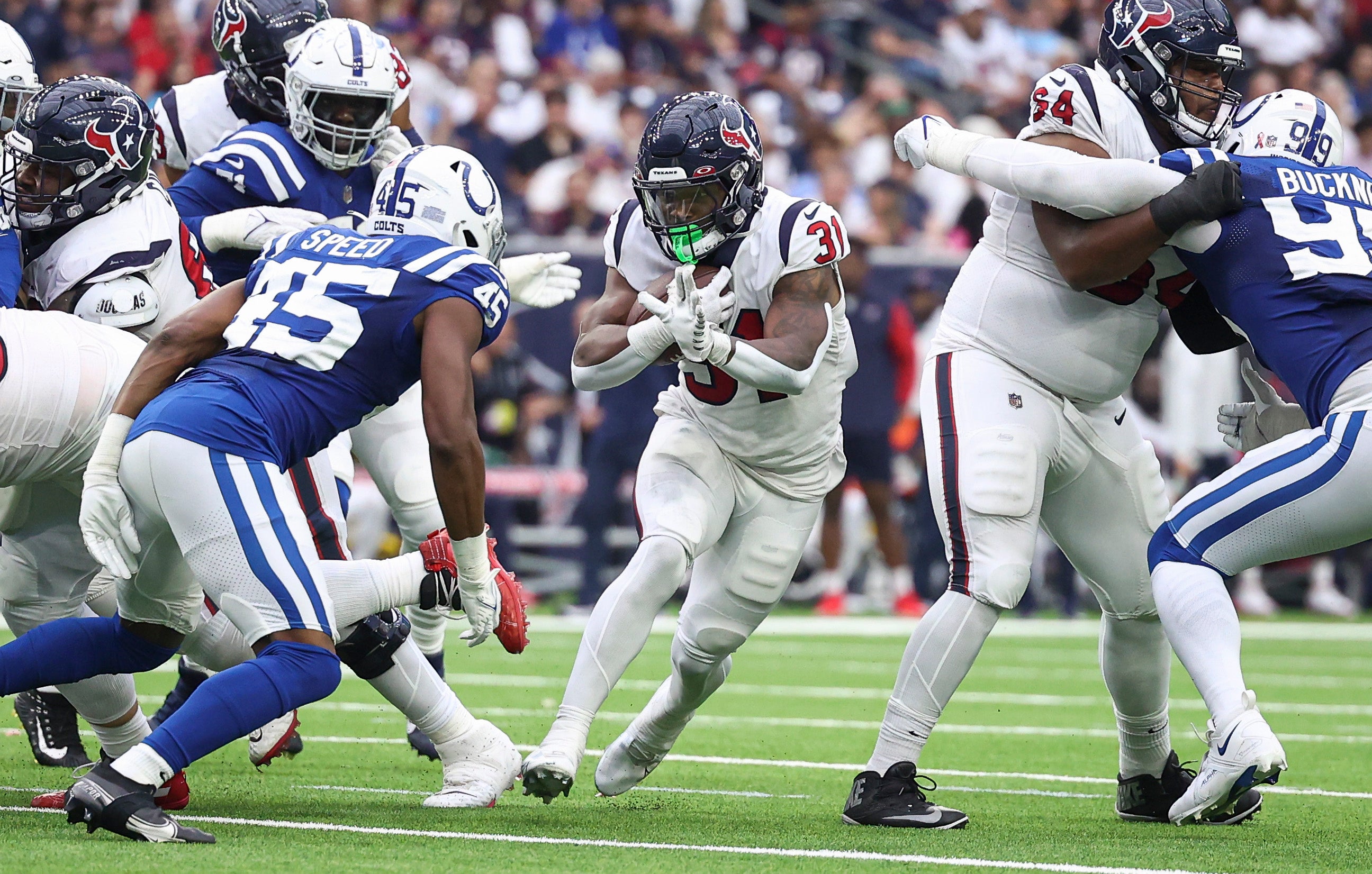 Sep 11, 2022; Houston, Texas, USA; Houston Texans running back Dameon Pierce (31) runs with the ball during the third quarter against the Indianapolis Colts at NRG Stadium.