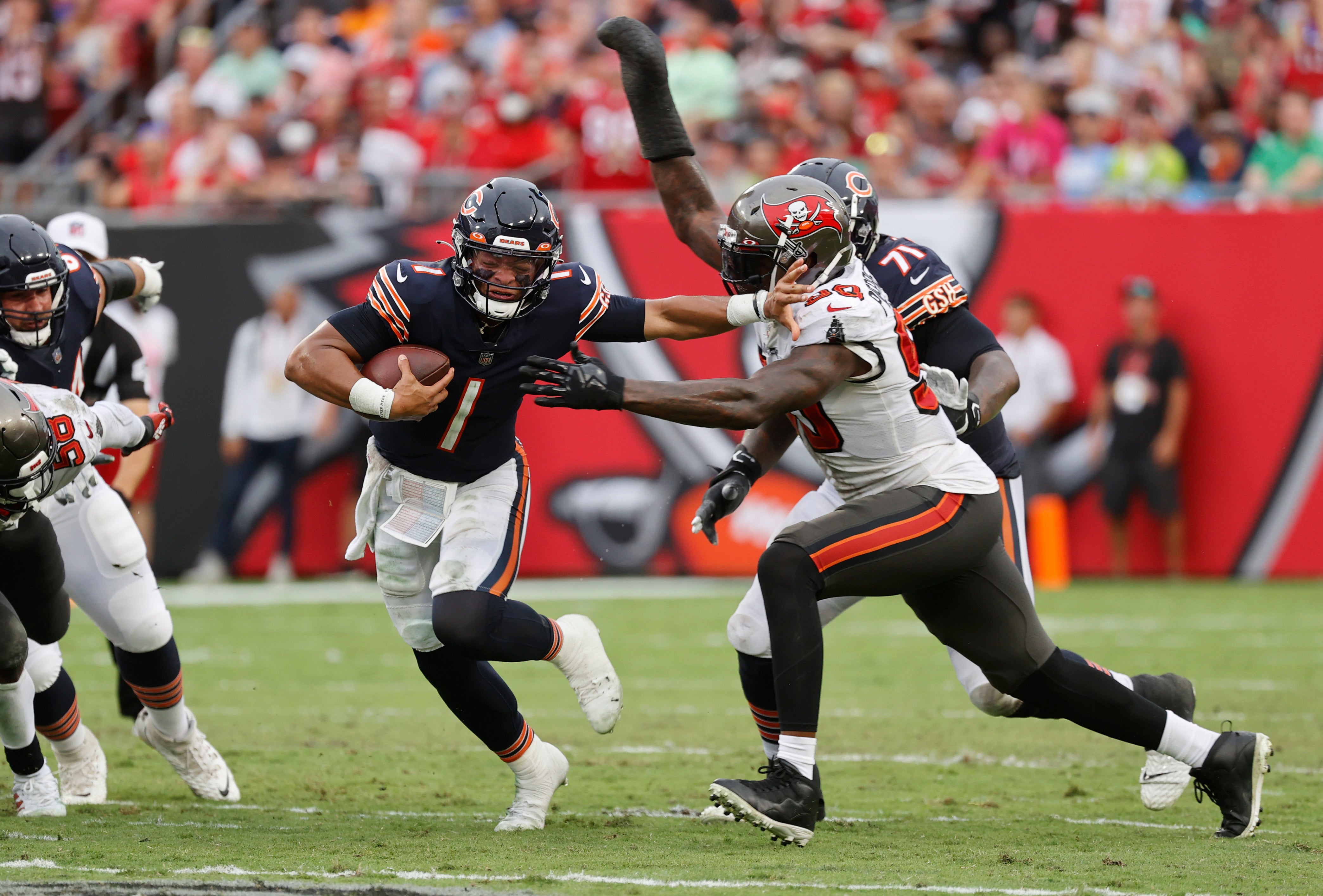 Oct 24, 2021; Tampa, Florida, USA; Tampa Bay Buccaneers outside linebacker Jason Pierre-Paul (90) sacks Chicago Bears quarterback Justin Fields (1) during the first half at Raymond James Stadium. Mandatory Credit: Kim Klement-USA TODAY Sports  
