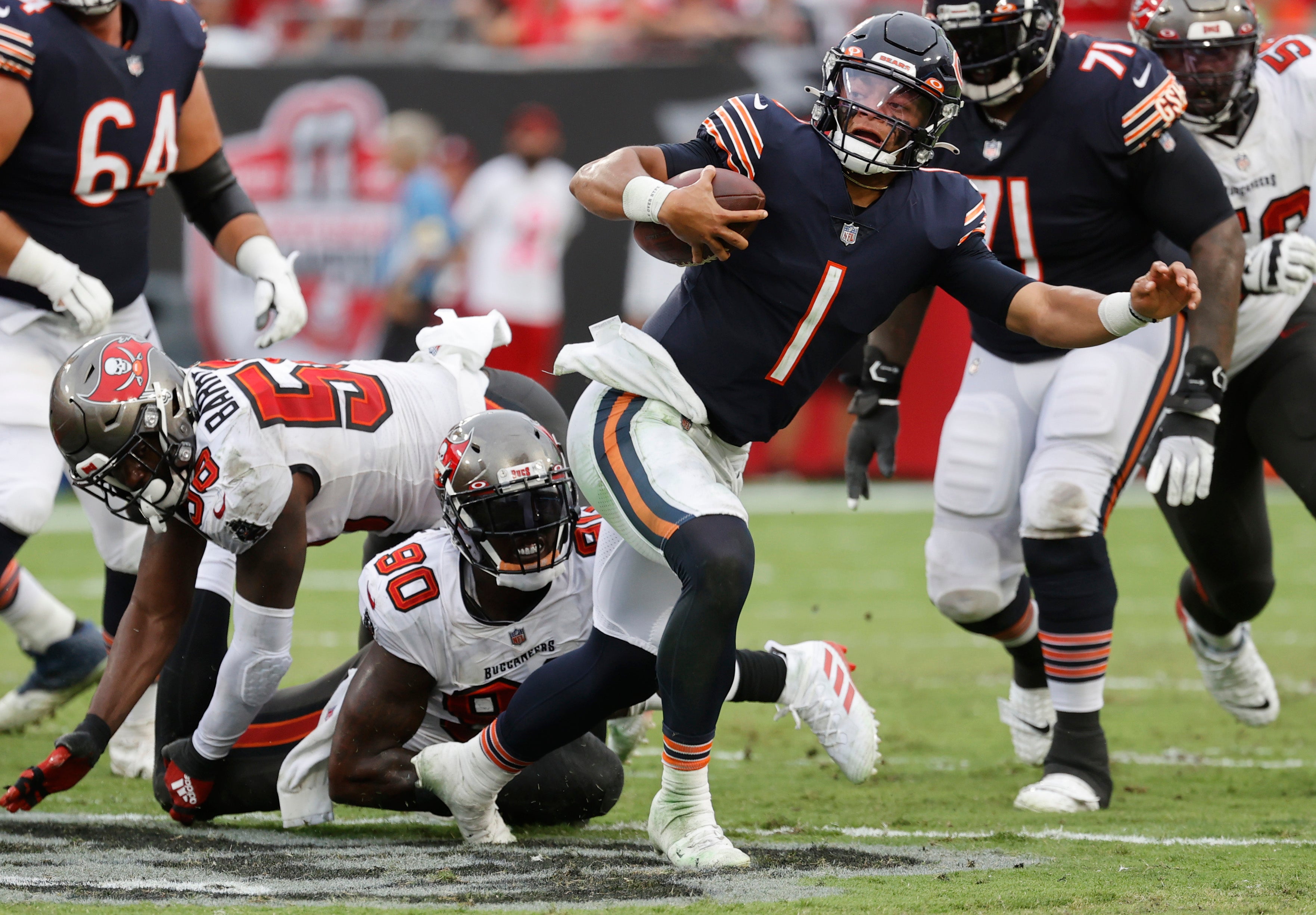 Oct 24, 2021; Tampa, Florida, USA; Tampa Bay Buccaneers outside linebacker Jason Pierre-Paul (90) sacks Chicago Bears quarterback Justin Fields (1) during the first half at Raymond James Stadium. Mandatory Credit: Kim Klement-USA TODAY Sports