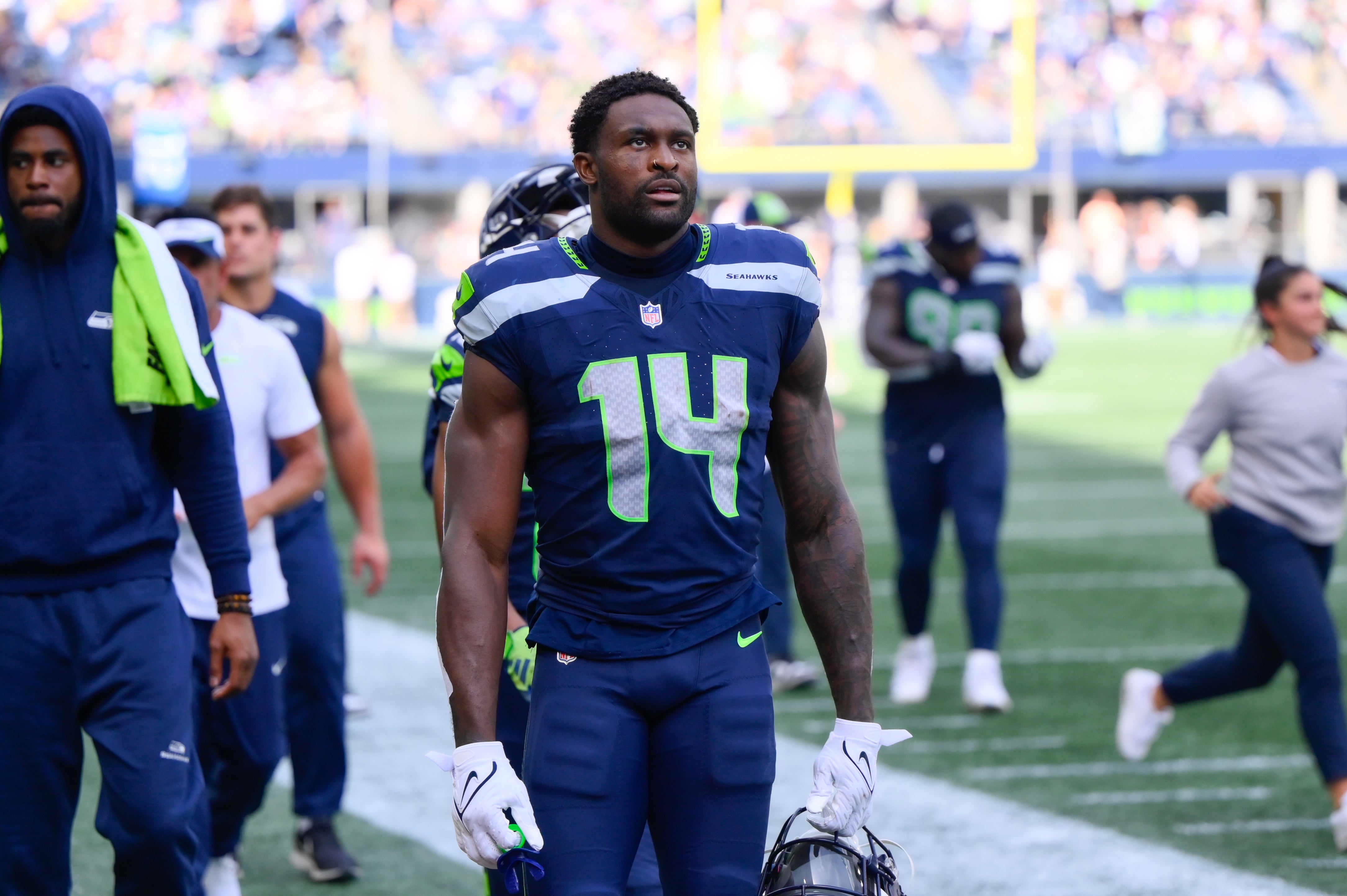 Sep 10, 2023; Seattle, Washington, USA; Seattle Seahawks wide receiver DK Metcalf (14) walks off the field during halftime against the Los Angeles Rams at Lumen Field. Mandatory Credit: Steven Bisig-USA TODAY Sports