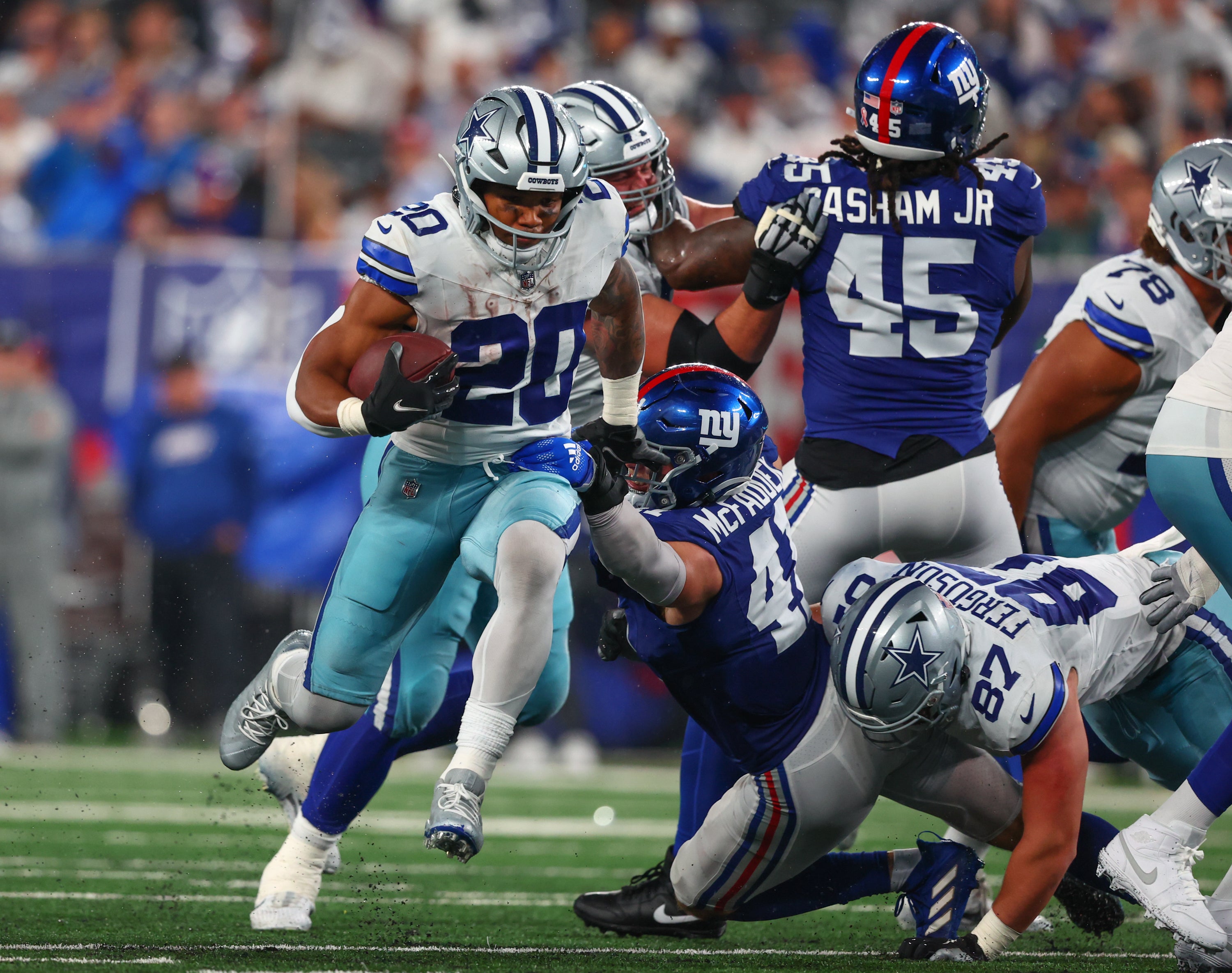 Dallas Cowboys running back Tony Pollard (20) runs with the ball against the New York Giants during the second half at MetLife Stadium. Mandatory Credit: Ed Mulholland-USA TODAY Sport