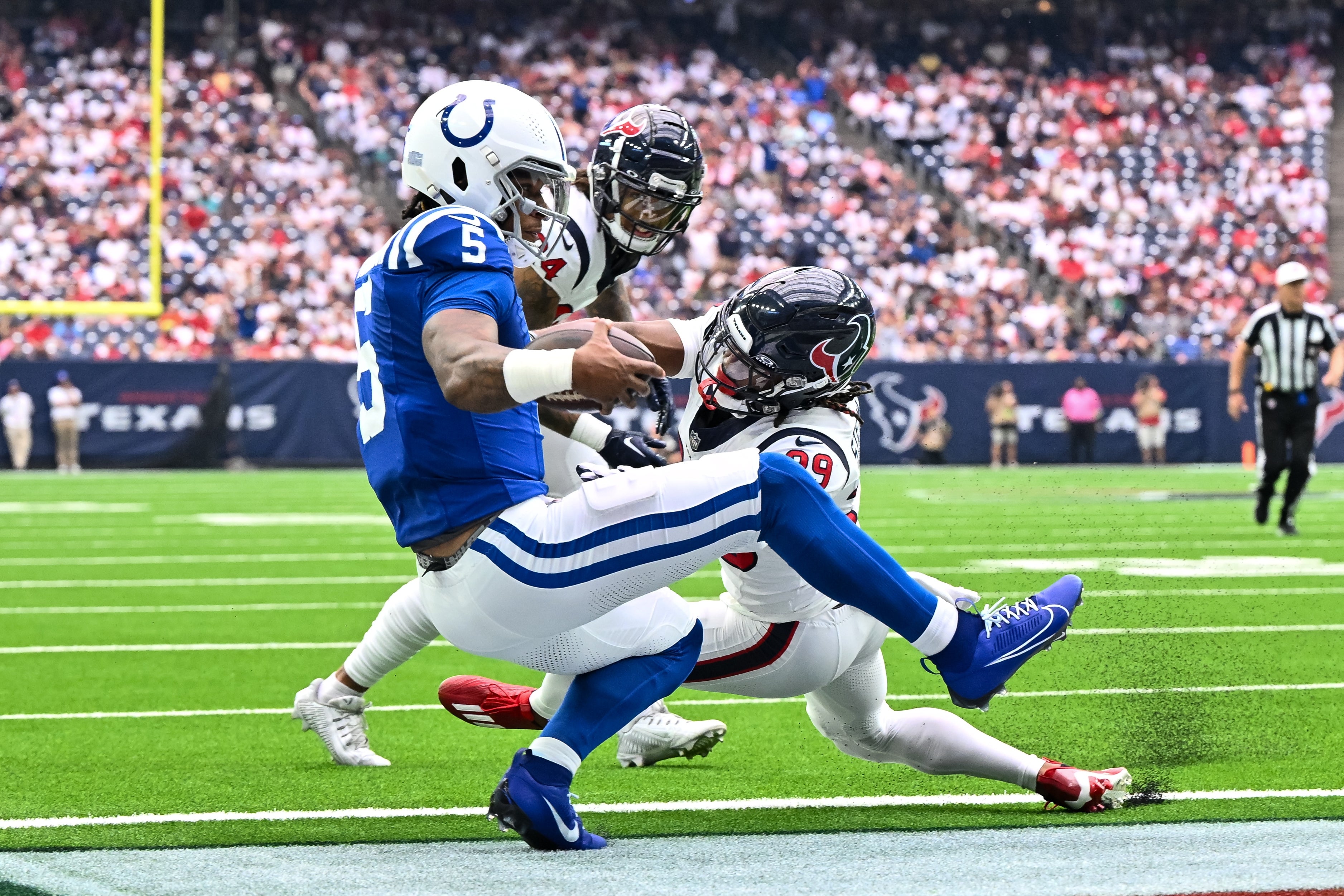 Sep 17, 2023; Houston, Texas, USA; Indianapolis Colts quarterback Anthony Richardson (5) runs the ball in for a touchdown during the first quarter against the Houston Texans at NRG Stadium.