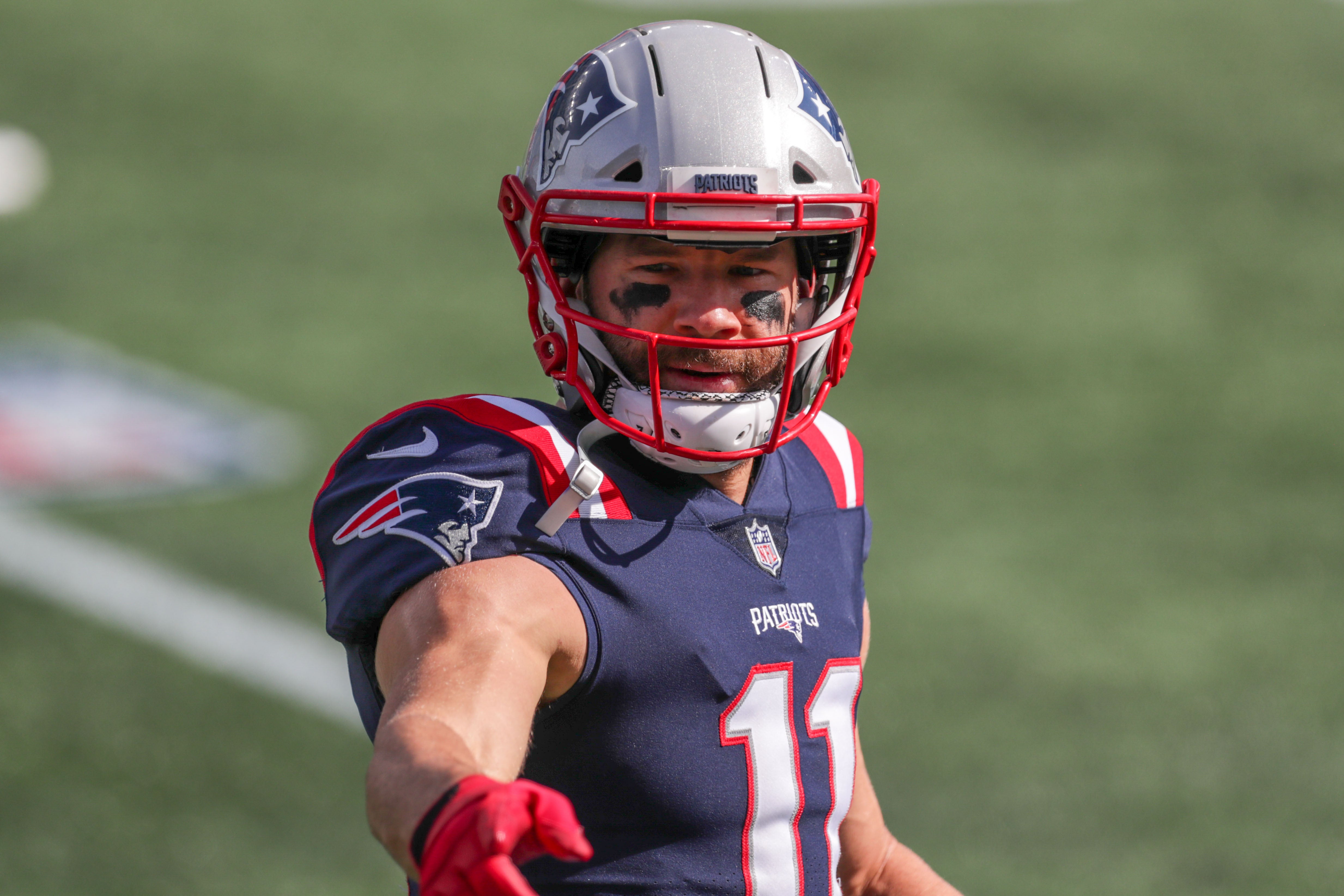 Oct 18, 2020; Foxborough, Massachusetts, USA; New England Patriots receiver Julian Edelman (11) warms up prior to the game against the Denver Broncos at Gillette Stadium.