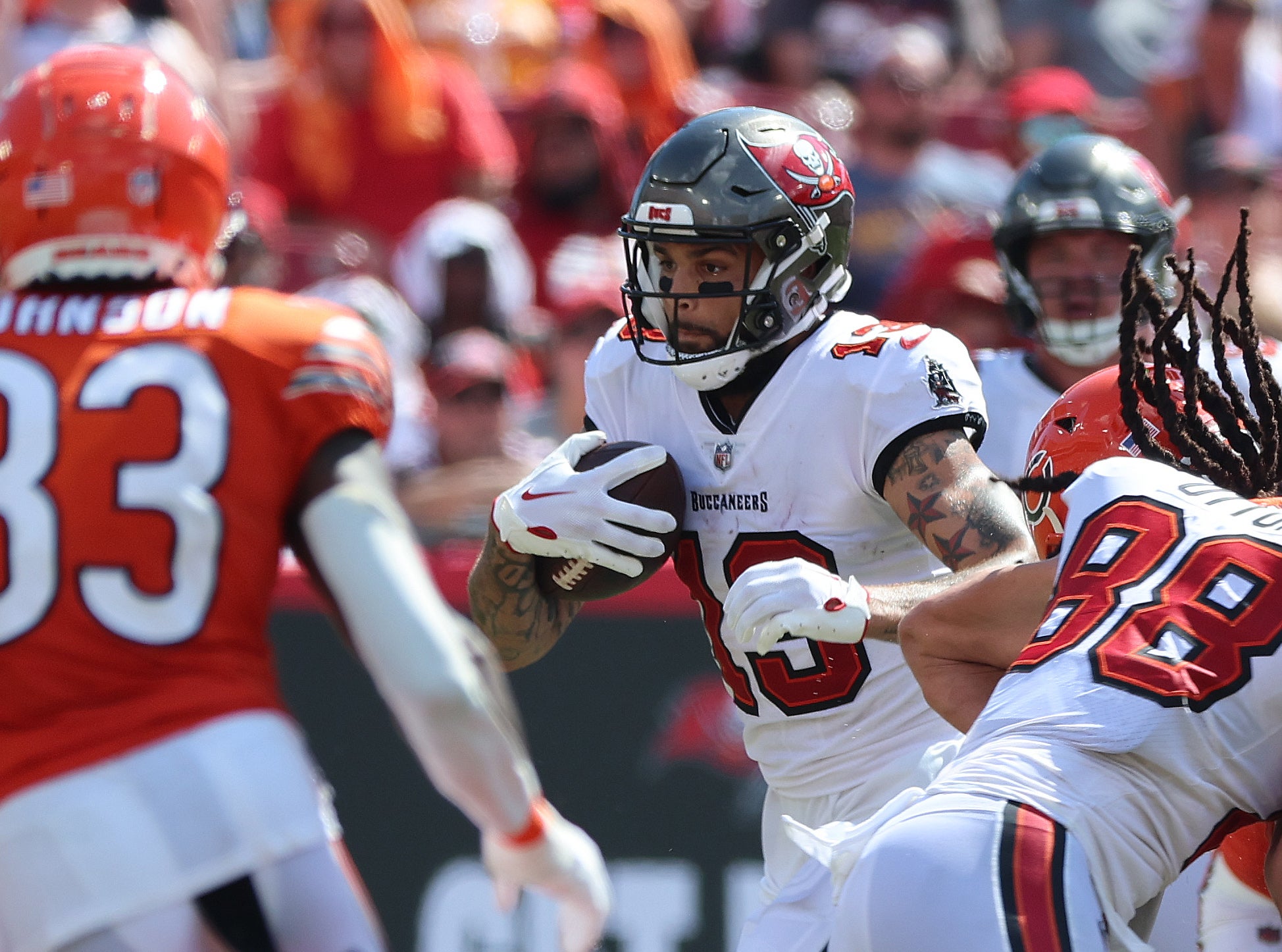 Sep 17, 2023; Tampa, Florida, USA; Tampa Bay Buccaneers wide receiver Mike Evans (13) runs with the ball against the Chicago Bears during the second half at Raymond James Stadium. Mandatory Credit: Kim Klement Neitzel-USA TODAY Sports
