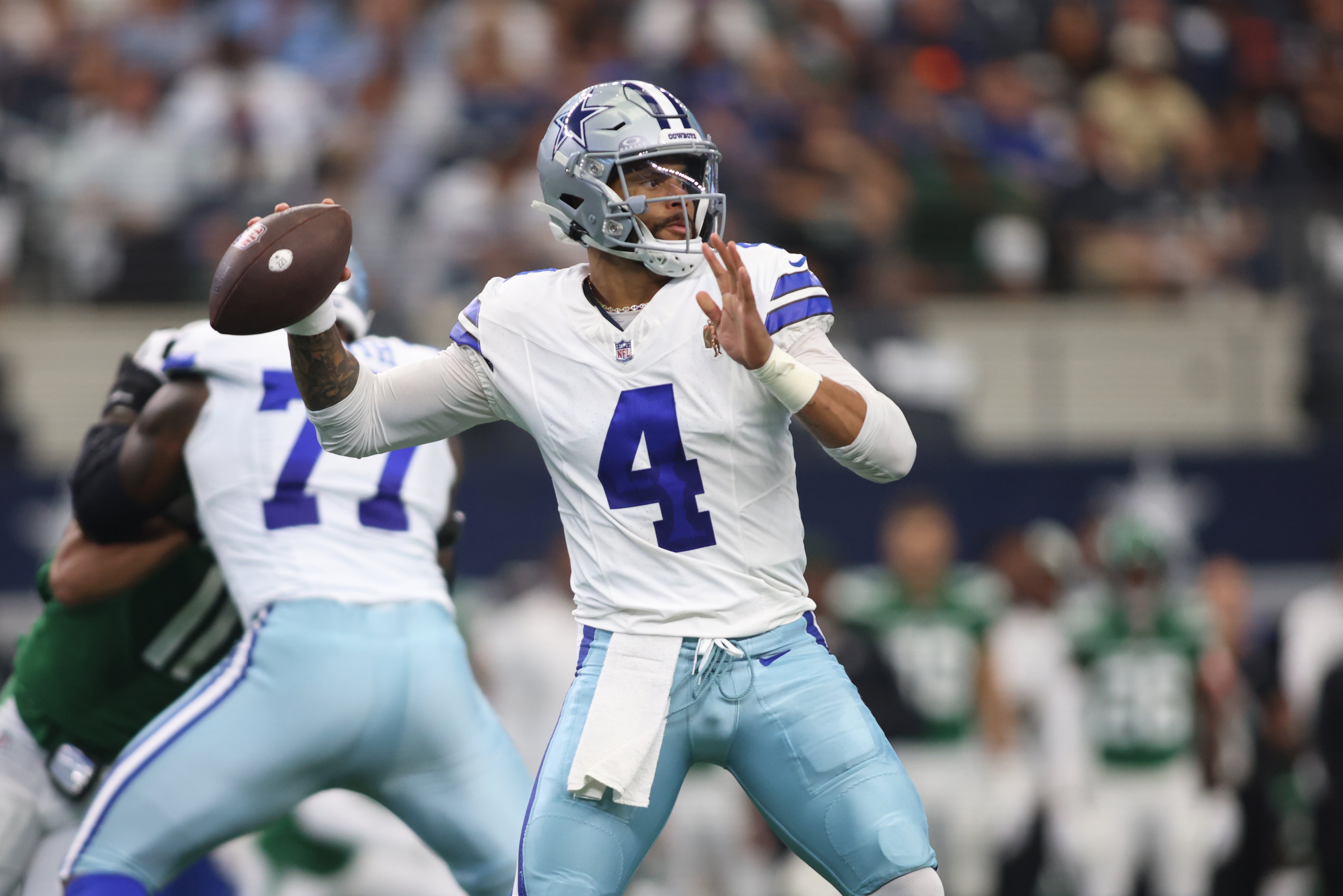 Dallas Cowboys quarterback Dak Prescott (4) throws a pass in the first quarter against the New York Jets at AT&T Stadium. Mandatory Credit: Tim Heitman-USA TODAY Sports