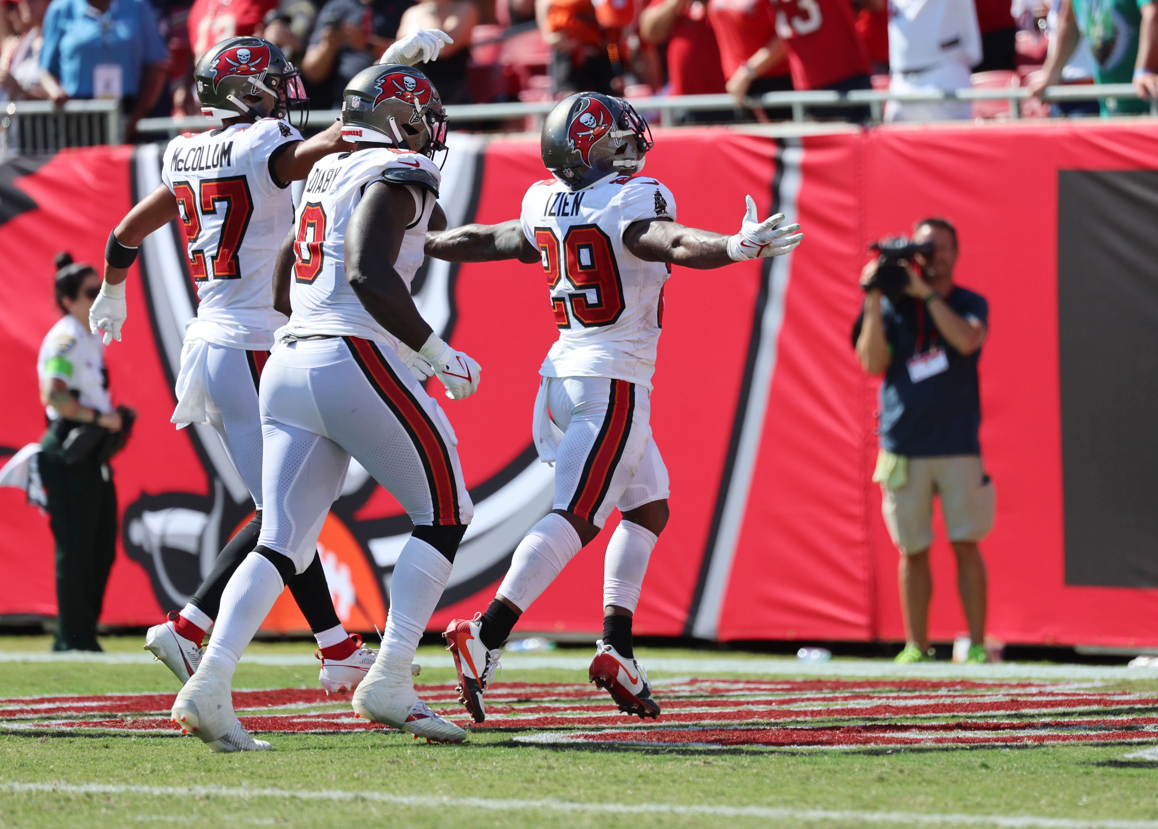 Sep 17, 2023; Tampa, Florida, USA; Tampa Bay Buccaneers safety Christian Izien (29) celebrates his interception against the Chicago Bears during the second half at Raymond James Stadium. Mandatory Credit: Kim Klement Neitzel-USA TODAY Sports