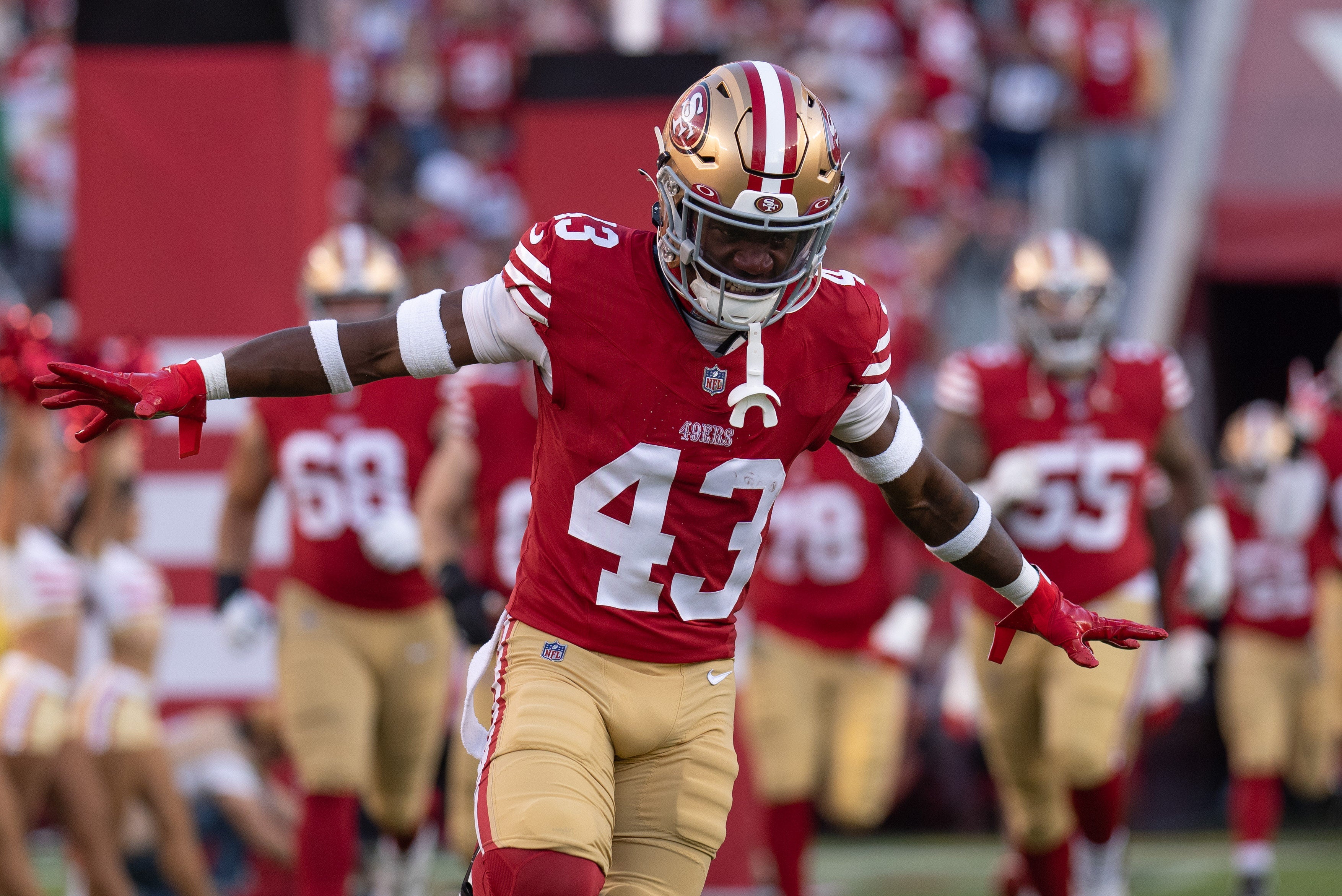 Aug 25, 2023; Santa Clara, California, USA; San Francisco 49ers cornerback Qwuantrezz Knight (43) runs out of the tunnel before the start of the first quarter against the Los Angeles Chargers at Levi's Stadium. Mandatory Credit: Stan Szeto-USA TODAY Sports