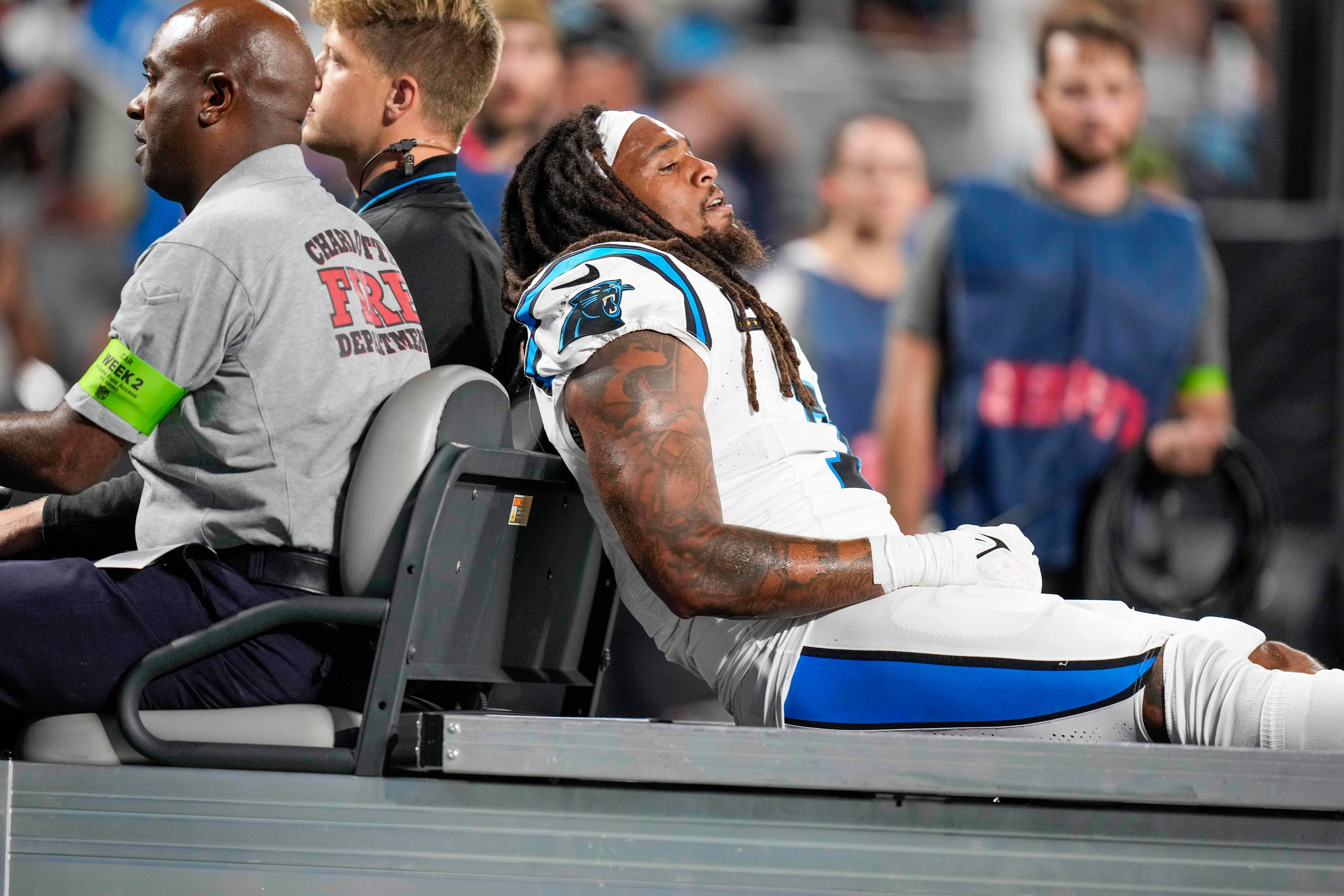 Sep 18, 2023; Charlotte, North Carolina, USA; Carolina Panthers linebacker Shaq Thompson (7) is carted to the locker room after an injury during the first quarter against the New Orleans Saints at Bank of America Stadium. Mandatory Credit: Jim Dedmon-USA TODAY Sports