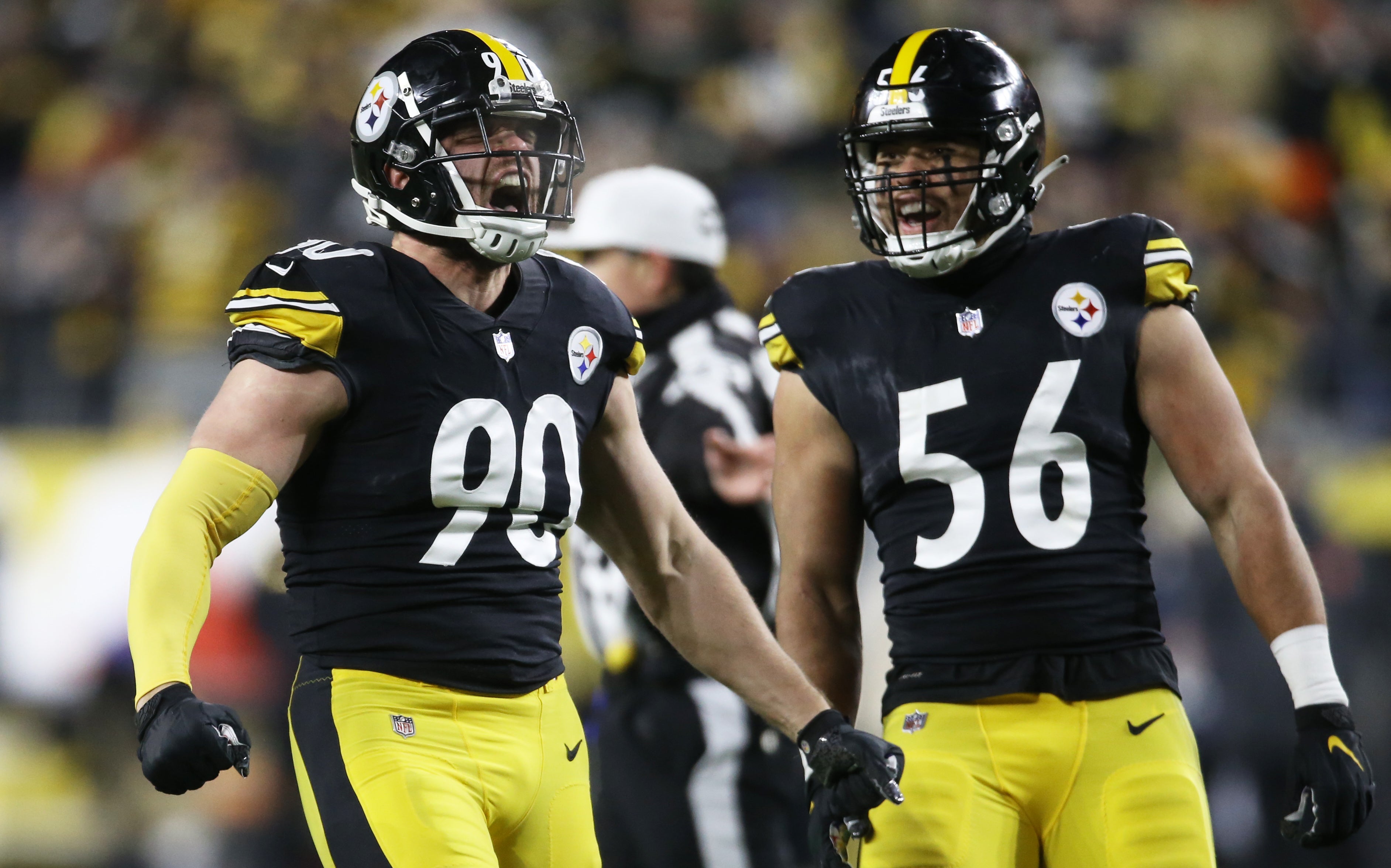 Jan 3, 2022; Pittsburgh, Pennsylvania, USA; Pittsburgh Steelers outside linebacker T.J. Watt (90) reacts alongside outside linebacker Alex Highsmith (56) after Watt recorded a sack against the Cleveland Browns during the first quarter at Heinz Field. Mandatory Credit: Charles LeClaire-USA TODAY Sports