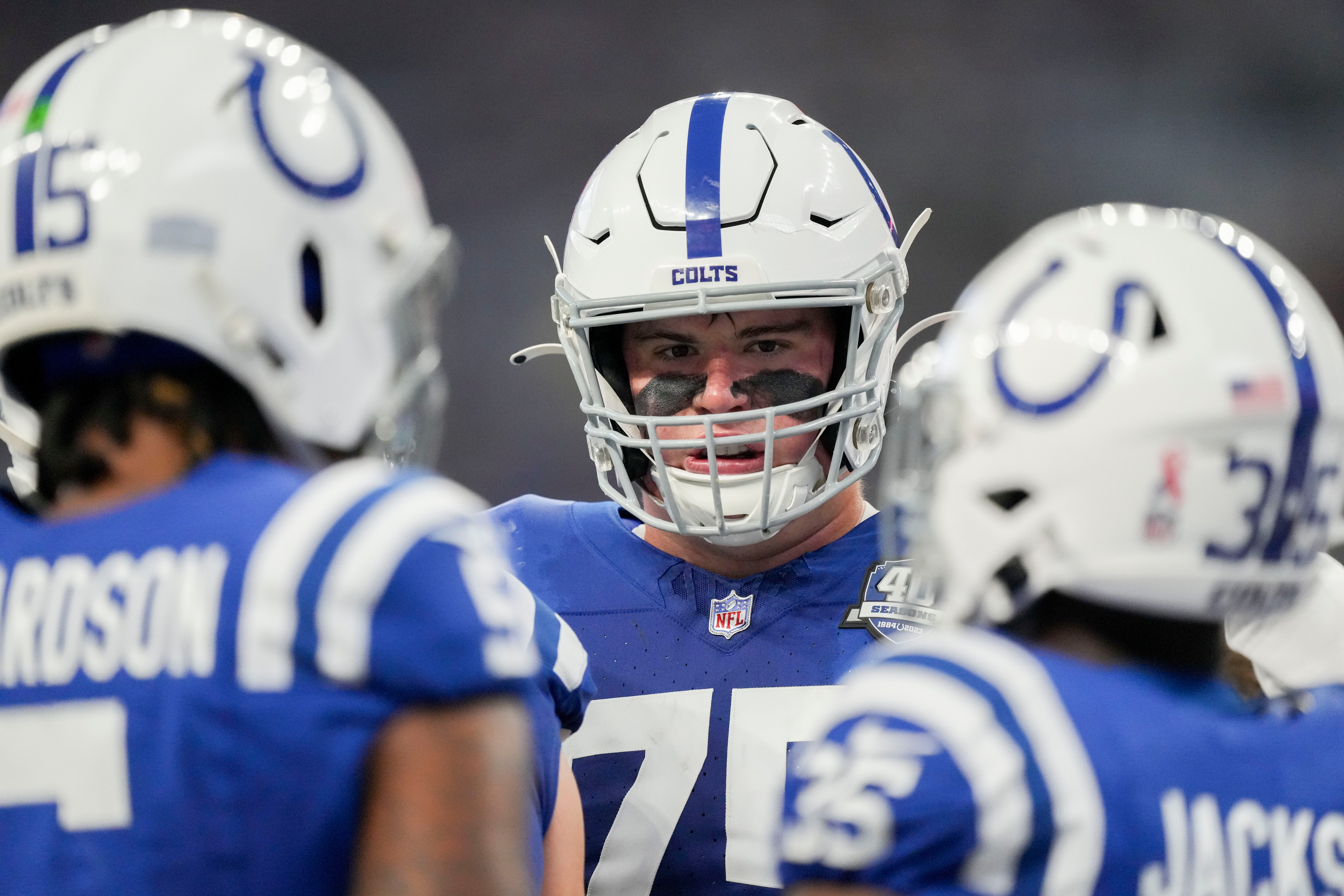 Indianapolis Colts guard Will Fries (75) talks with teammates Sunday, Sept. 10, 2023, during a game against the Jacksonville Jaguars at Lucas Oil Stadium in Indianapolis.