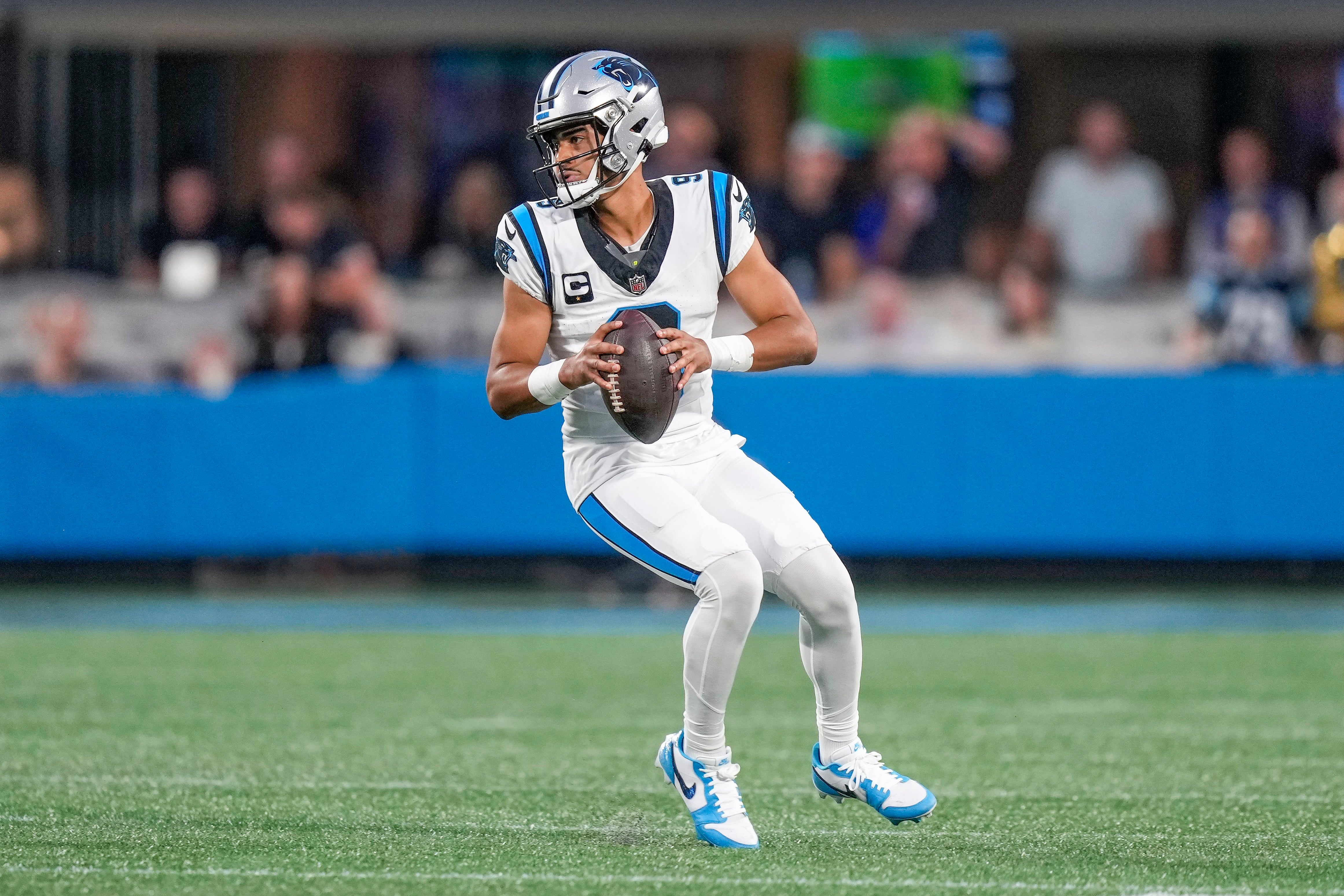 Sep 18, 2023; Charlotte, North Carolina, USA; Carolina Panthers quarterback Bryce Young (9) scurries out of the pocket during the first quarter against the New Orleans Saints at Bank of America Stadium. Mandatory Credit: Jim Dedmon-USA TODAY Sports