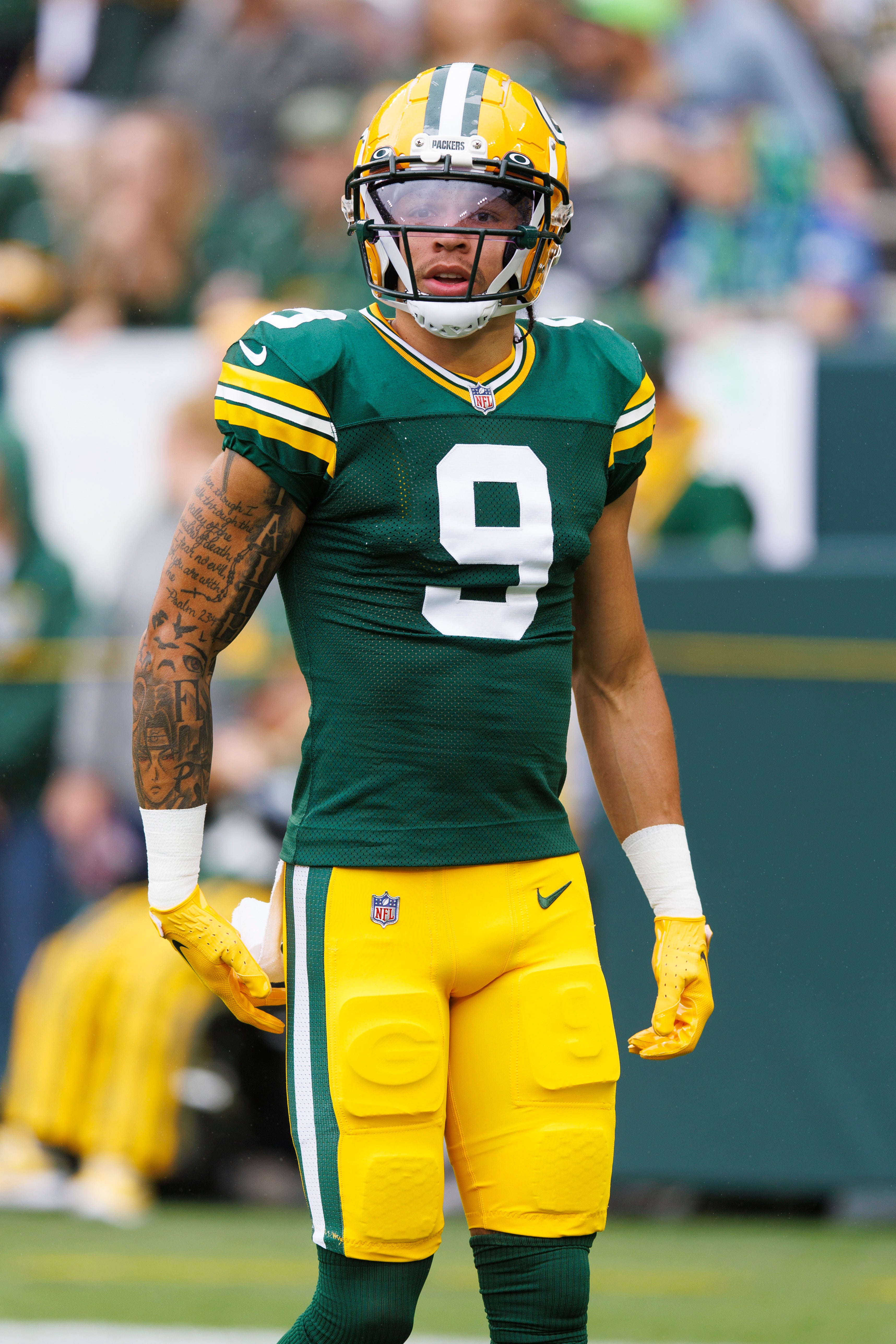 Aug 26, 2023; Green Bay, Wisconsin, USA; Green Bay Packers wide receiver Christian Watson (9) during warmups prior to the game against the Seattle Seahawks at Lambeau Field. Mandatory Credit: Jeff Hanisch-USA TODAY Sports