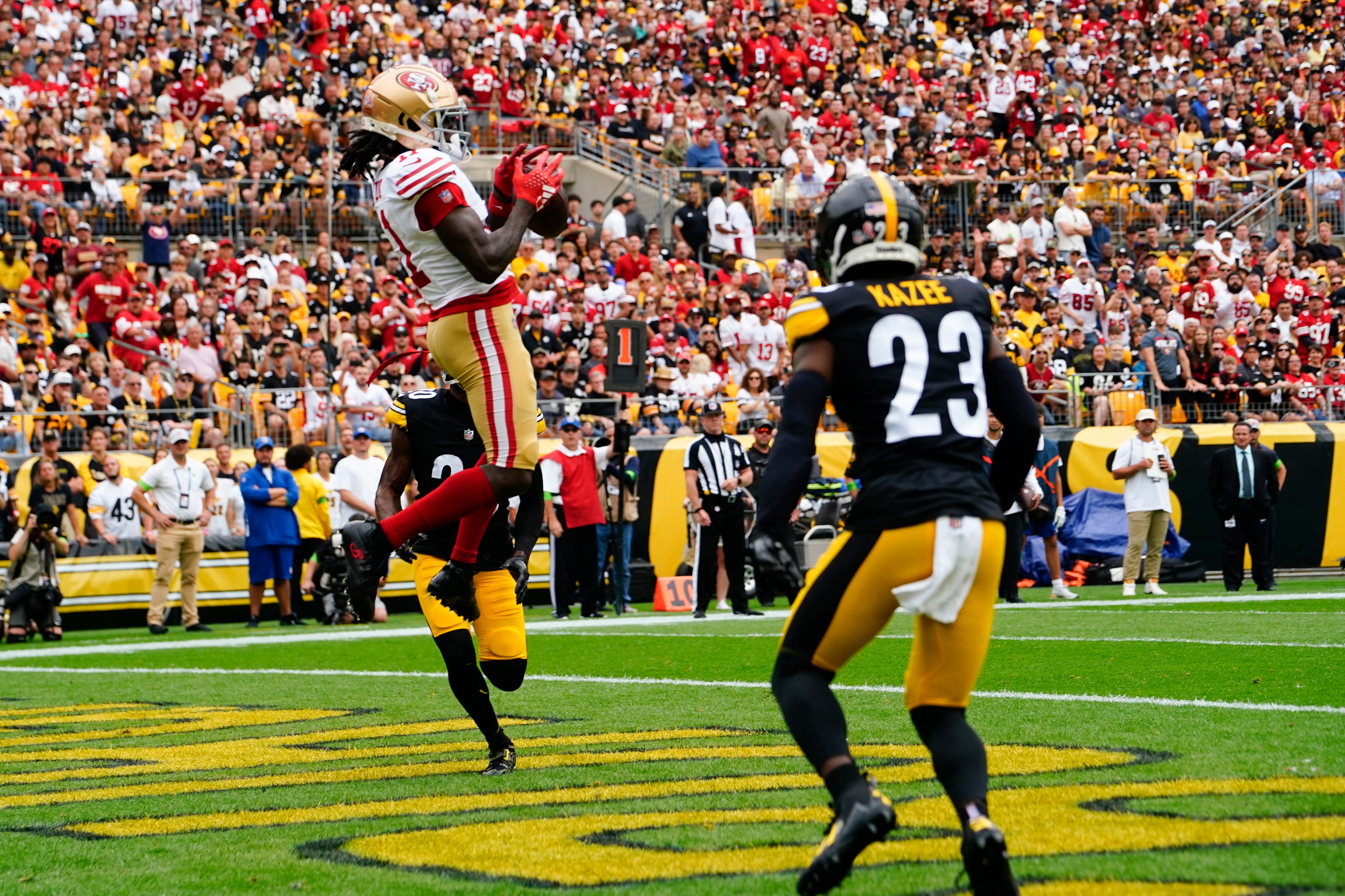 Sep 10, 2023; Pittsburgh, Pennsylvania, USA; San Francisco 49ers wide receiver Brandon Aiyuk (11) catches a pass for a touchdown against the Pittsburgh Steelers during the first half at Acrisure Stadium. Mandatory Credit: Gregory Fisher-USA TODAY Sports