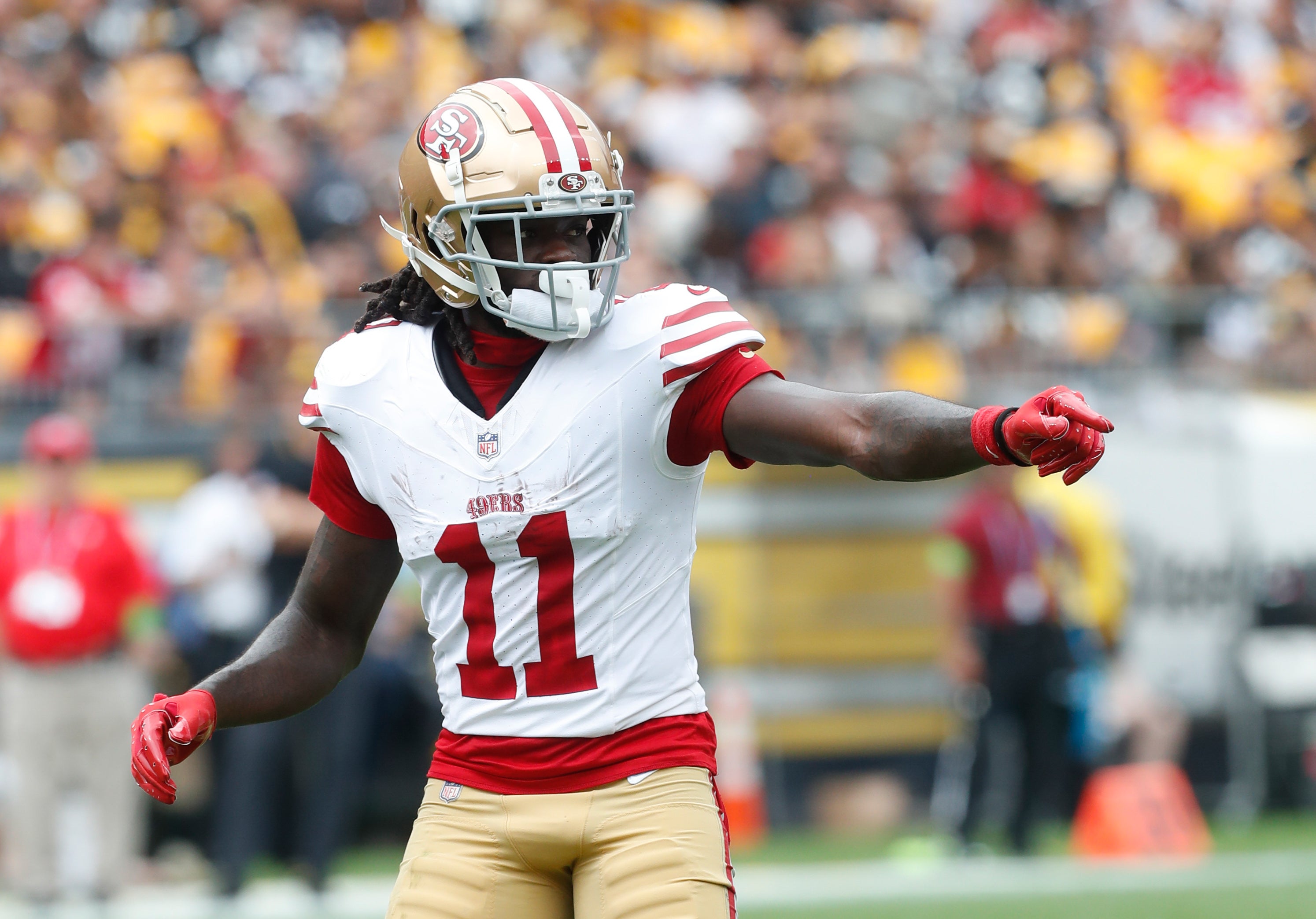 Sep 10, 2023; Pittsburgh, Pennsylvania, USA; San Francisco 49ers wide receiver Brandon Aiyuk (11) gestures at the line of scrimmage against the Pittsburgh Steelers during the first quarter at Acrisure Stadium. Mandatory Credit: Charles LeClaire-USA TODAY Sports