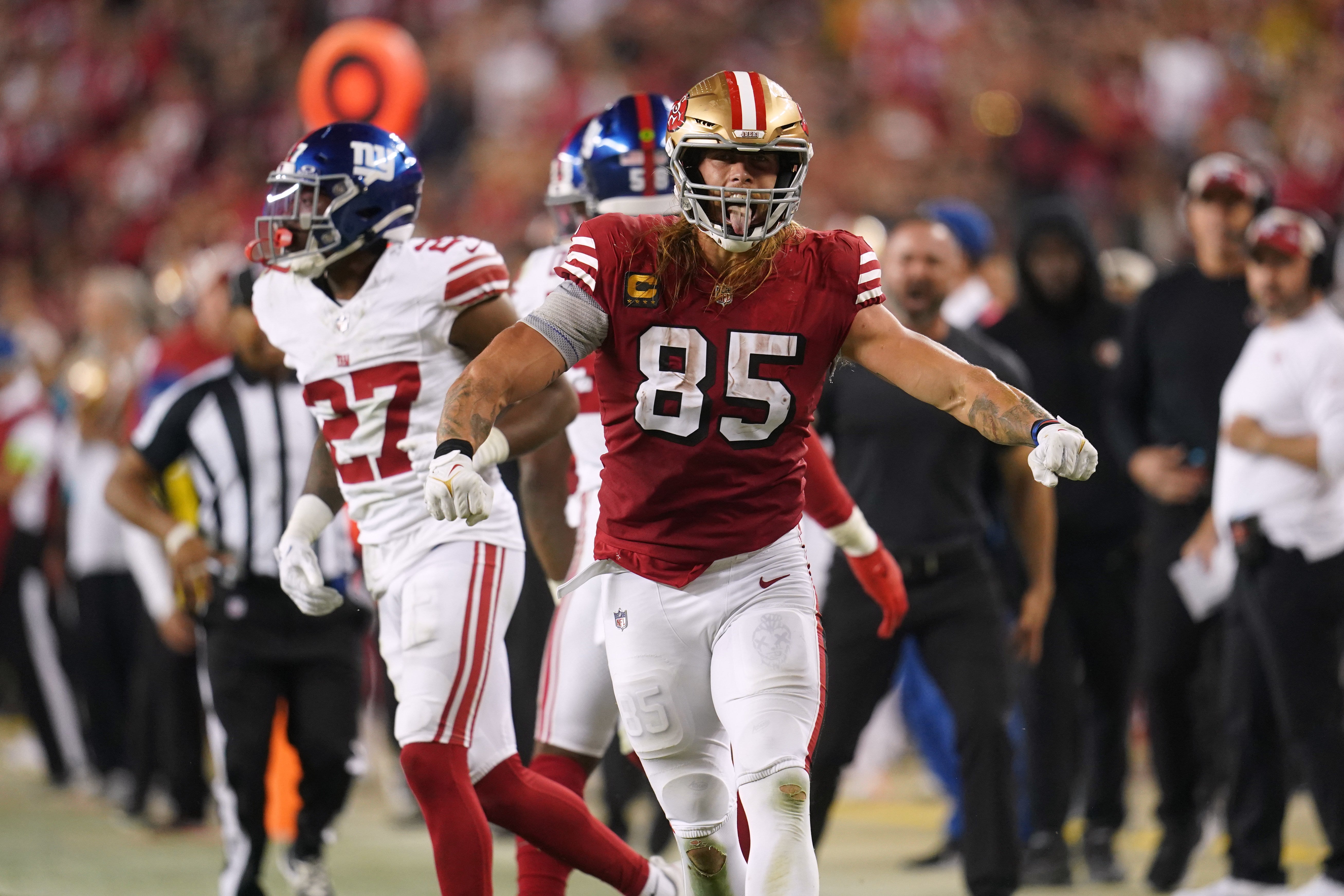 Sep 21, 2023; Santa Clara, California, USA; San Francisco 49ers tight end George Kittle (85) celebrates after catching a pass for a first down against the New York Giants in the third quarter at Levi's Stadium. Mandatory Credit: Cary Edmondson-USA TODAY Sports