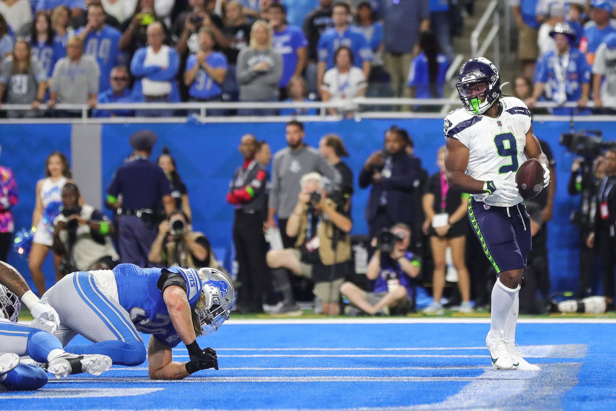 Seattle Seahawks running back Kenneth Walker III scores a touchdown against the Detroit Lions during the first half at Ford Field in Detroit on Sunday, Sept. 17, 2023.