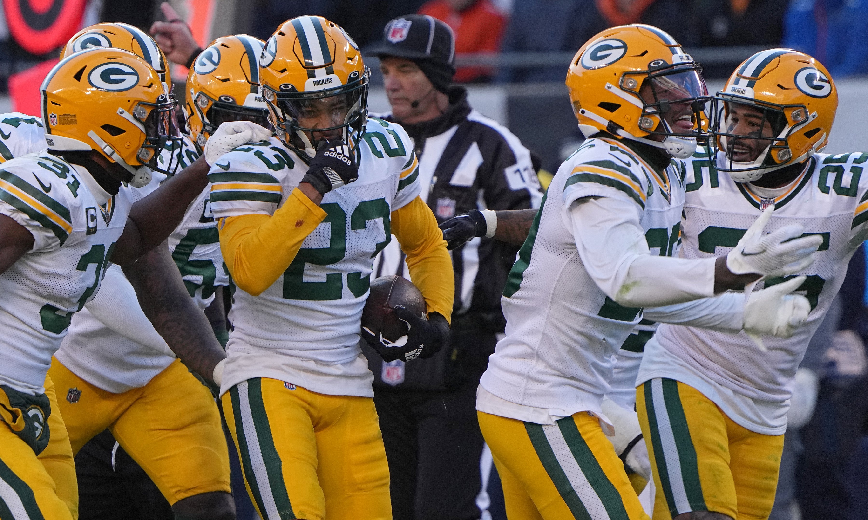 Dec 4, 2022; Chicago, Illinois, USA; Green Bay Packers cornerback Jaire Alexander (23) celibates his interception during the fourth quarter of their game at Soldier Field. Mandatory Credit: Mark Hoffman-USA TODAY Sports