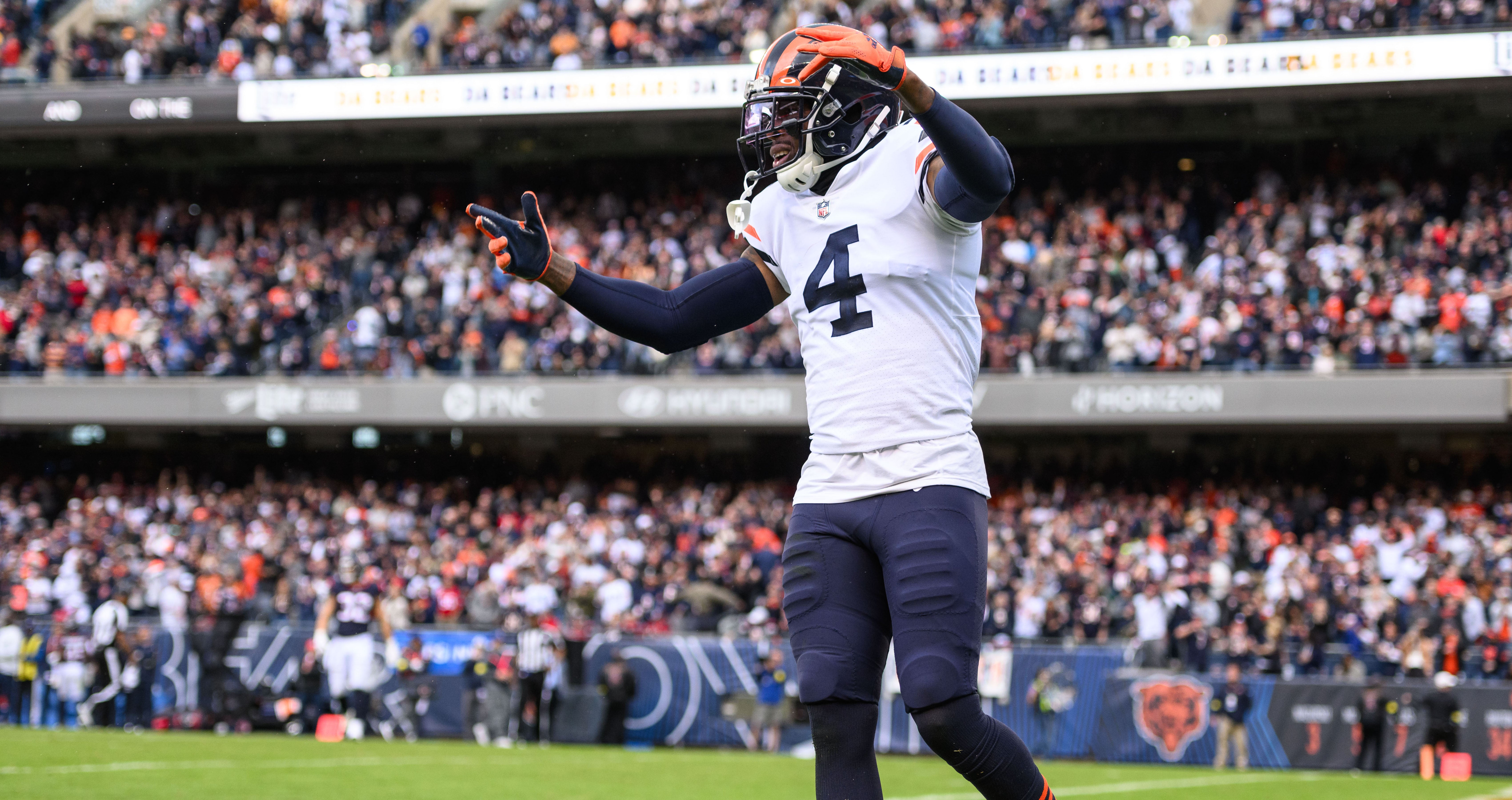 Sep 25, 2022; Chicago, Illinois, USA; Chicago Bears free safety Eddie Jackson (4) celebrates a defensive play in the fourth quarter against the Houston Texans at Soldier Field. Mandatory Credit: Daniel Bartel-USA TODAY Sports