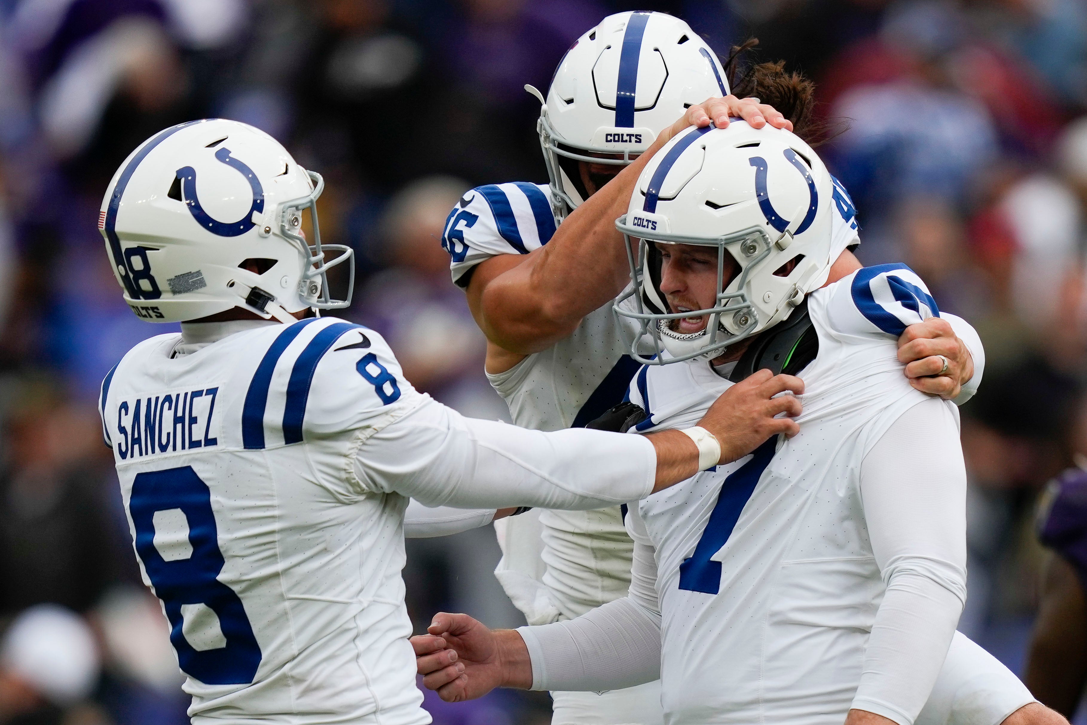 Sep 24, 2023; Baltimore, Maryland, USA; Indianapolis Colts place kicker Matt Gay (7), Indianapolis Colts punter Rigoberto Sanchez (8), and Indianapolis Colts long snapper Luke Rhodes (46) react after Gay kicks a game winning field goal in overtime over the Baltimore Ravens at M&T Bank Stadium.